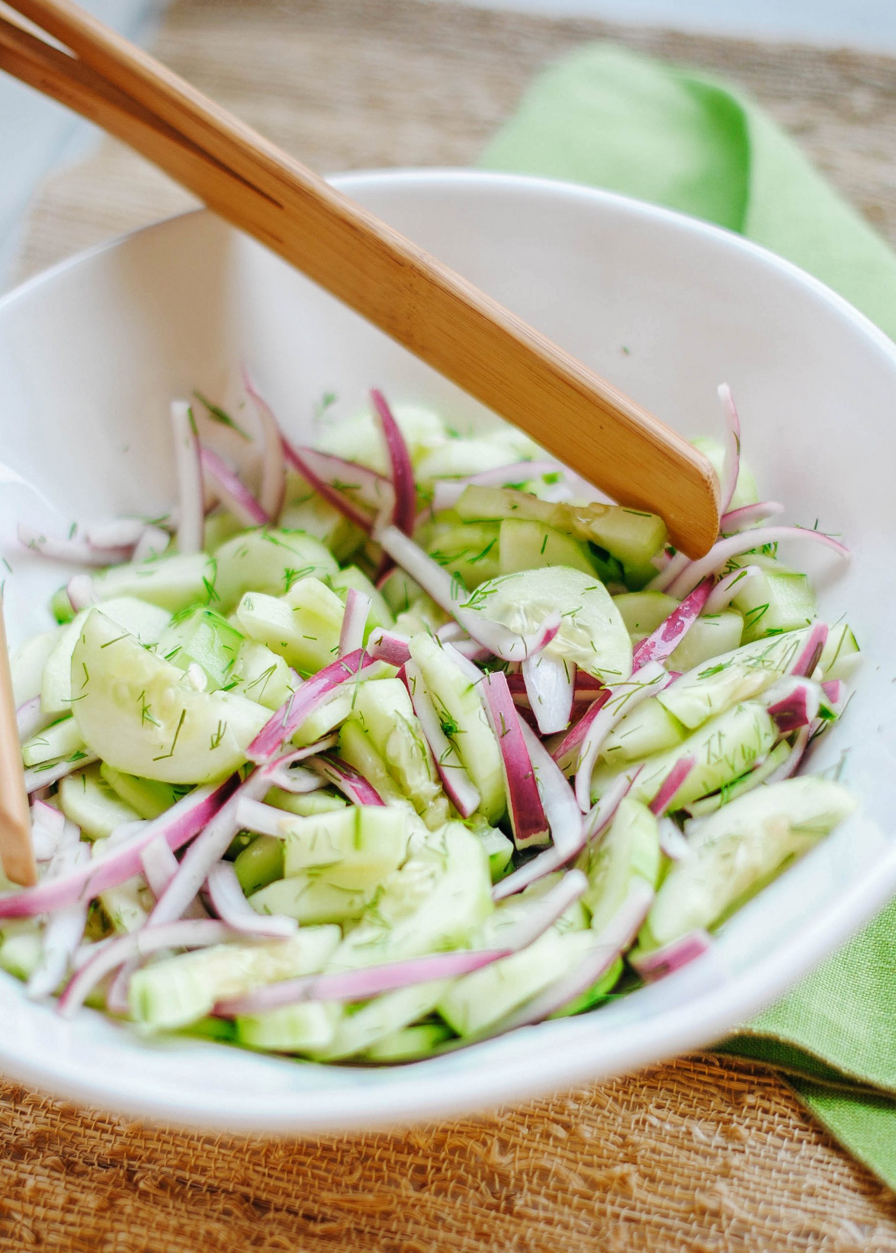 Fresh and crisp Sweet Cucumber, Red Onion and Dill Salad made with 5 simple ingredients and the perfect recipe for the summer!