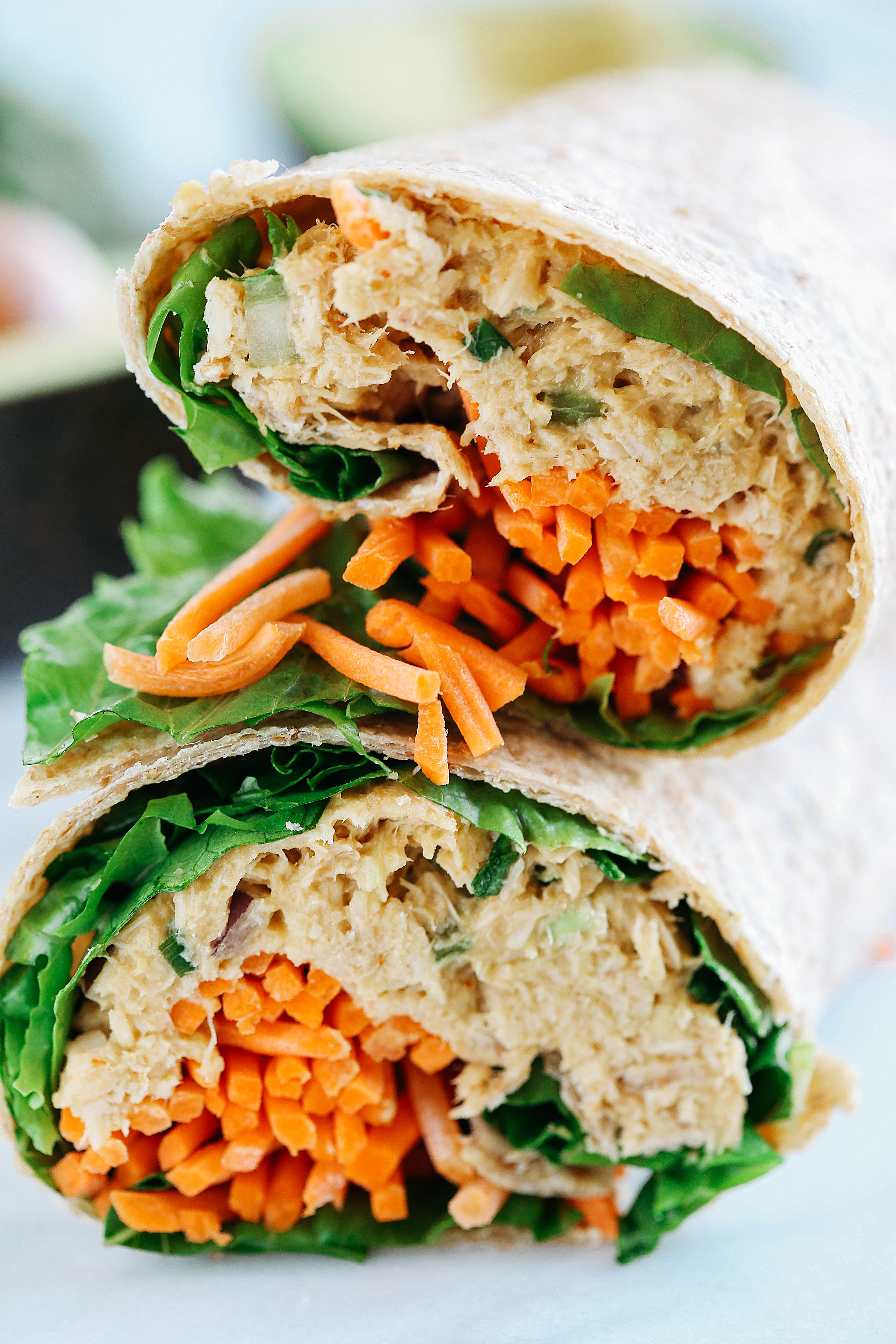 These Spicy Tuna Avocado Wraps are light and fresh, full of flavor and only take 5 minutes to make! The perfect healthy lunch for a busy work week!