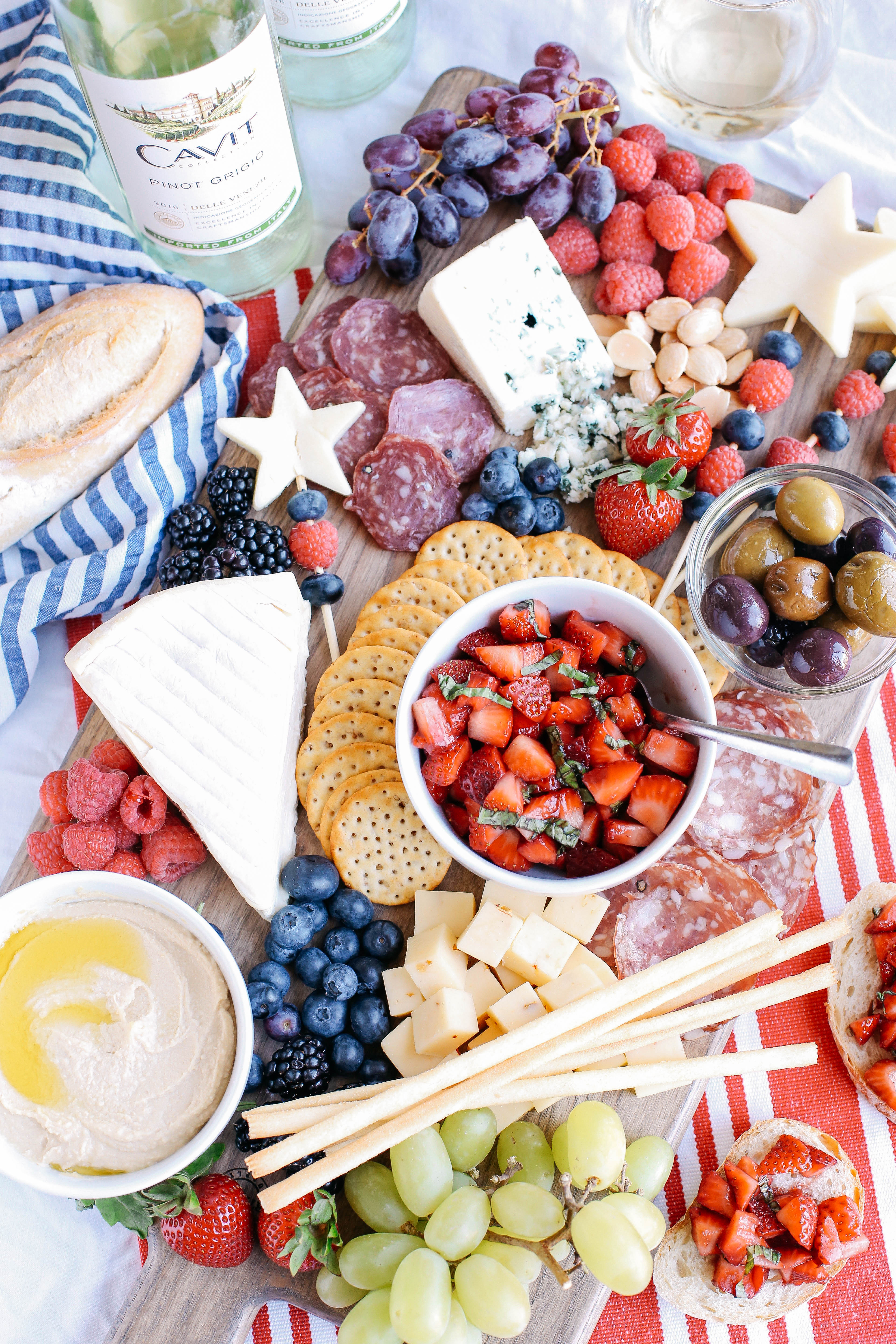 Memorial Day is right around the corner so kick off the summer with the Ultimate Patriotic Cheeseboard! Grab your favorite bottle of wine and share this festive appetizer with your friends and family this holiday!