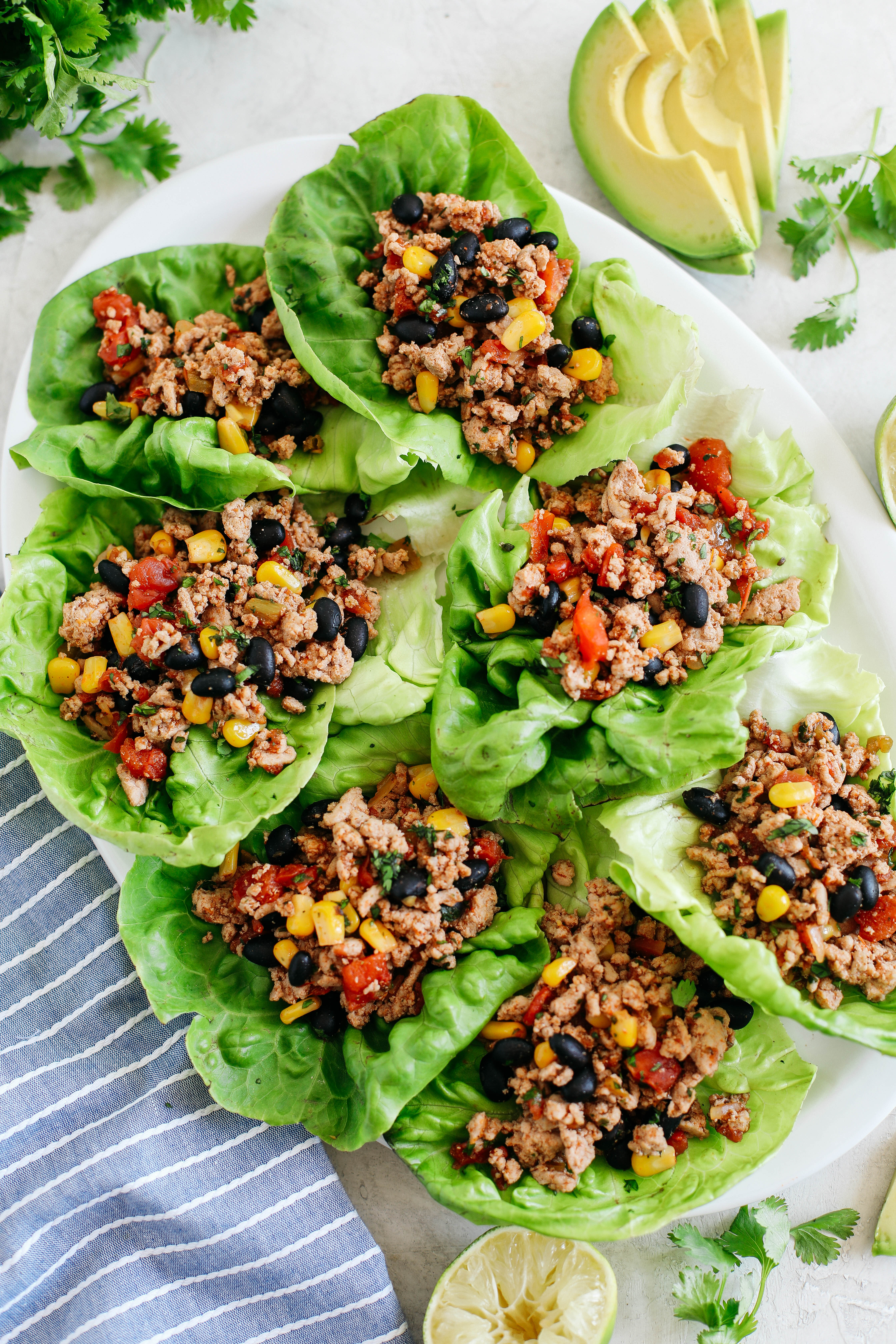 Light and healthy Turkey Taco Lettuce Wraps that are an easy low carb alternative to traditional tacos, are super flavorful and take less than 20 minutes to make!