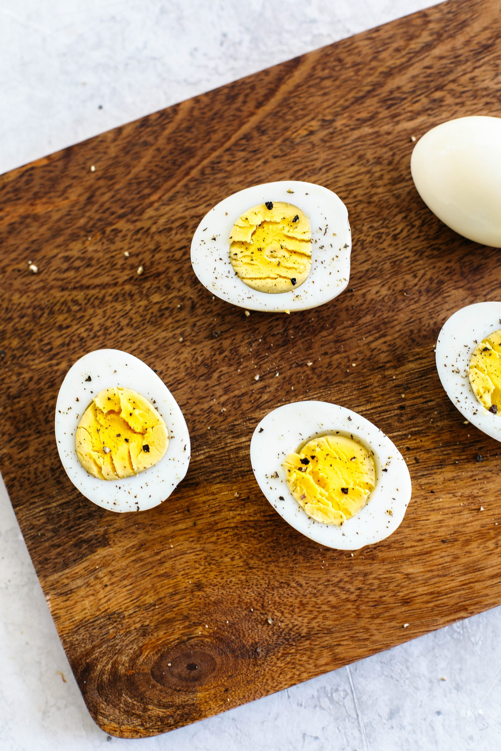 Perfectly cooked hard boiled eggs in the Instant Pot that are easy to peel and ready in just 15 minutes!  Hands down the easiest method and perfect for meal prep!