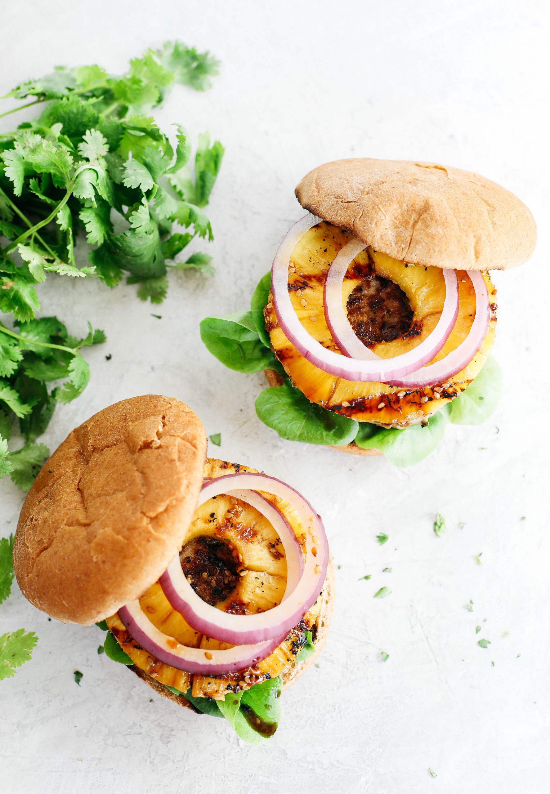 These delicious Hawaiian Turkey Burgers are packed with tons of flavor, made with a healthy homemade teriyaki sauce and topped with fresh grilled pineapple!