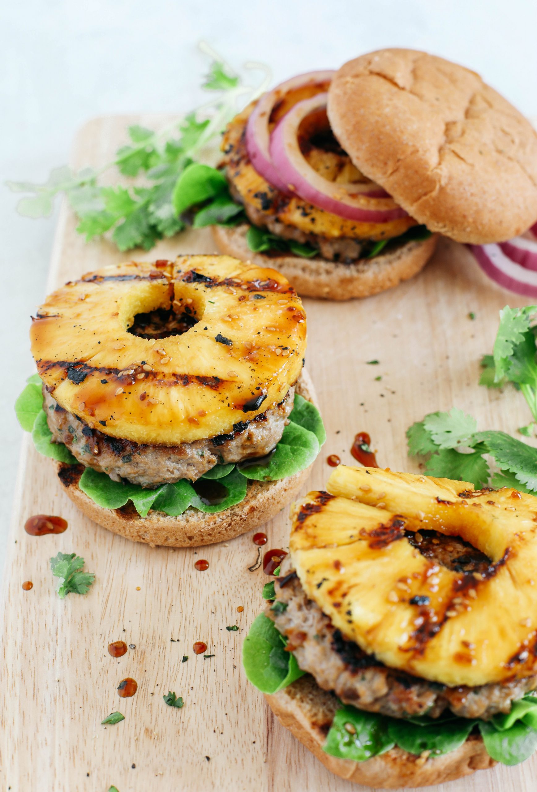 These delicious Hawaiian Turkey Burgers are packed with tons of flavor, made with a healthy homemade teriyaki sauce and topped with fresh grilled pineapple!