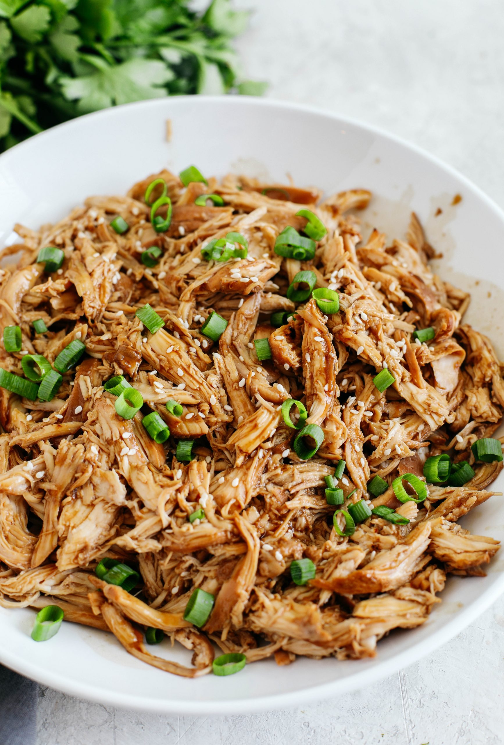 The EASIEST Crock Pot Teriyaki Chicken made with the most delicious sticky, sweet homemade sauce and served over rice or quinoa!  Better than take-out!