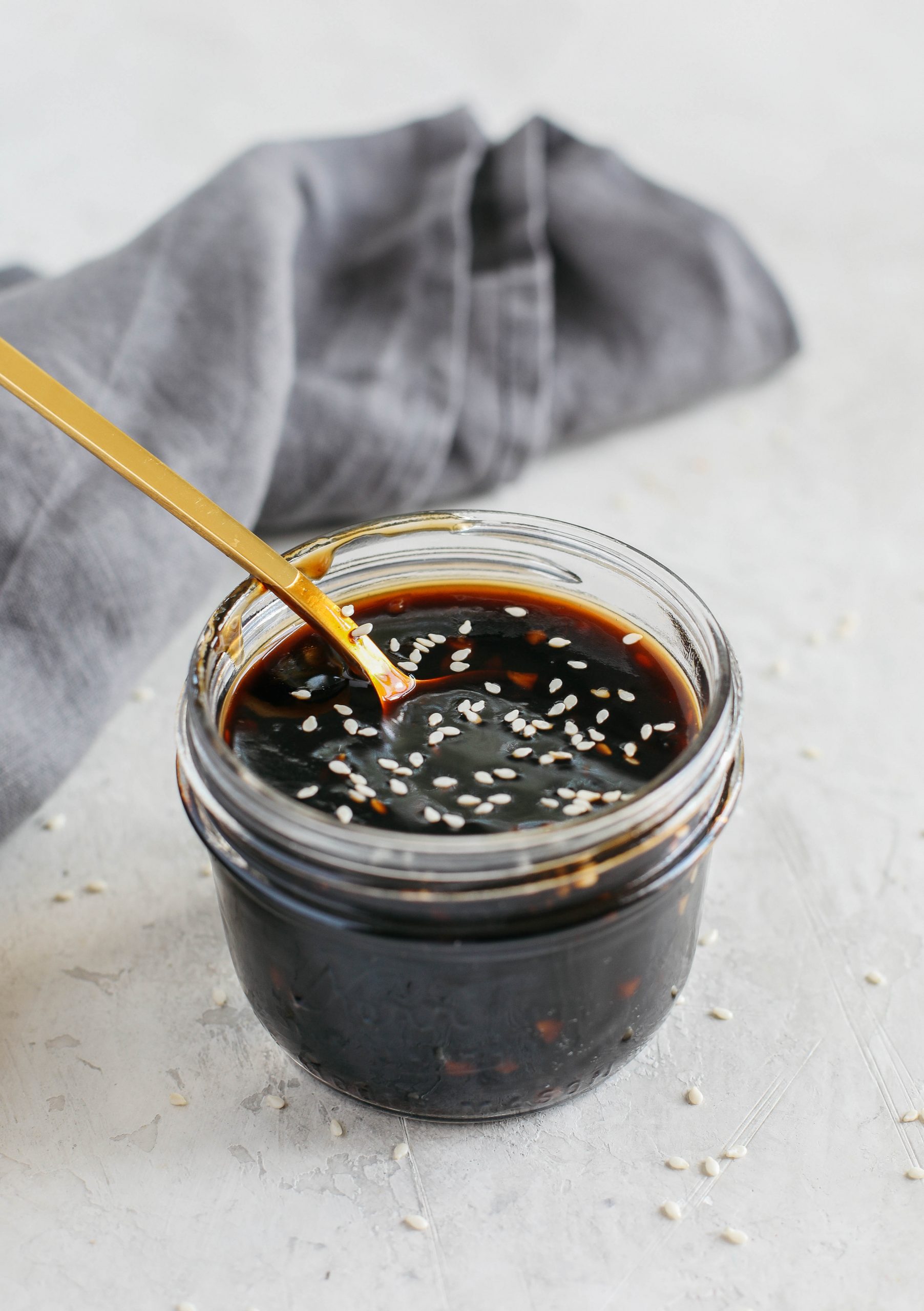 Skip store-bought and make this EASY Healthy Teriyaki Sauce that is sticky, sweet and made in just 5 minutes using fresh, simple ingredients!