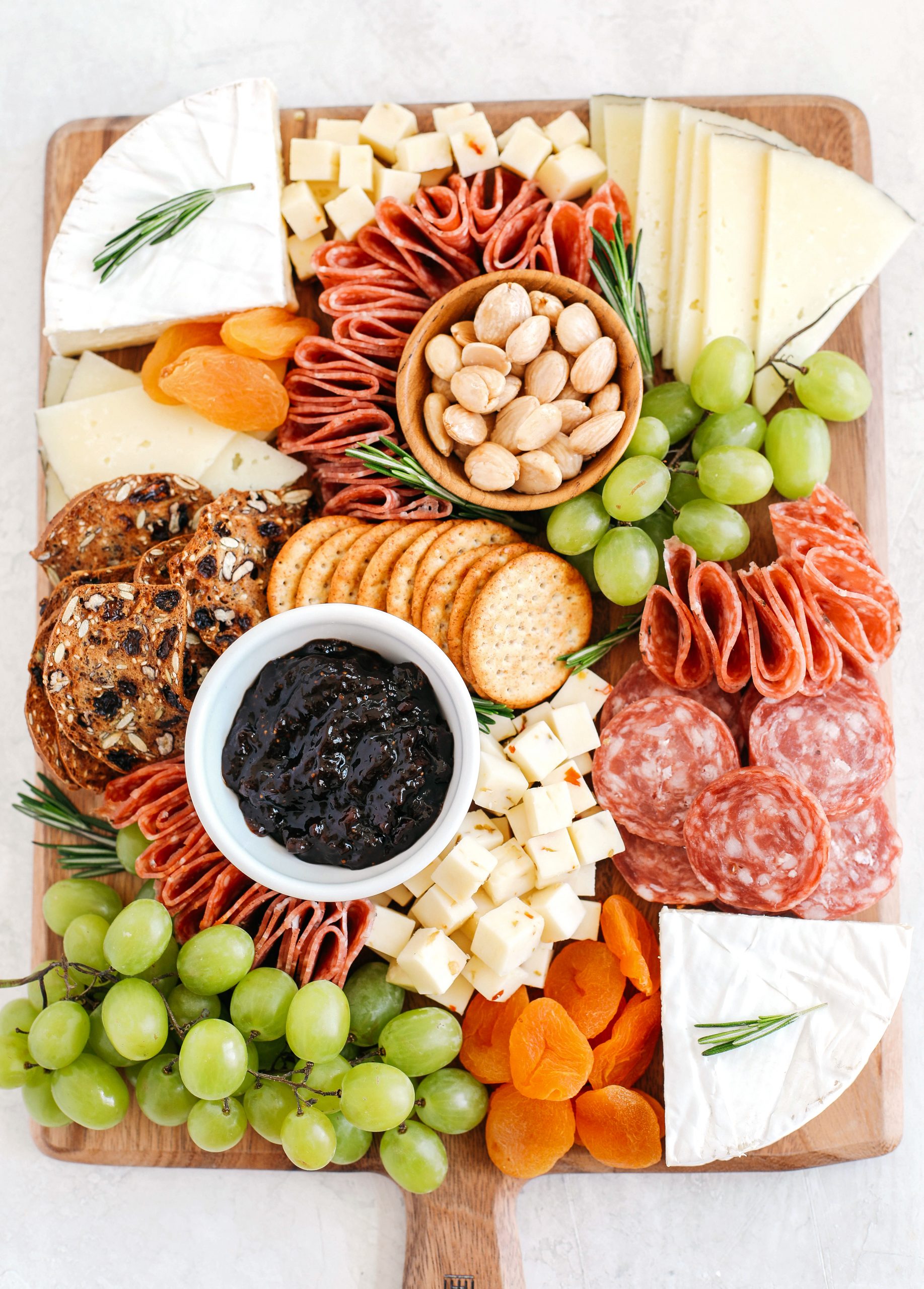 My favorite tips and tricks for building a perfect cheeseboard with all your favorite charcuterie that is simple, beautiful and made in just minutes!