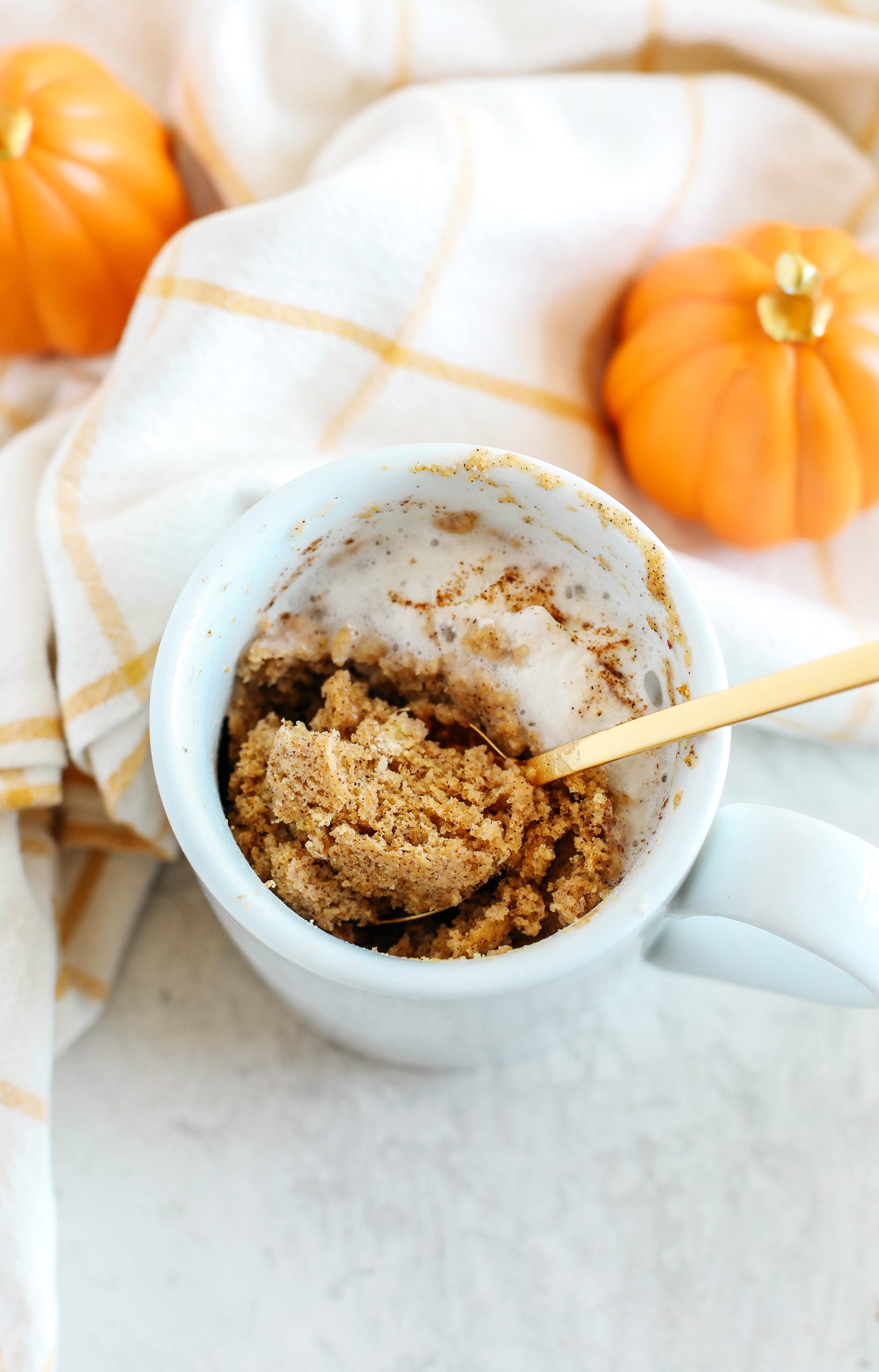 The most delicious Pumpkin Spice Mug Cake that makes the perfect single serving and easily made in under 2 minutes!  It's also gluten-free, dairy-free and paleo!  