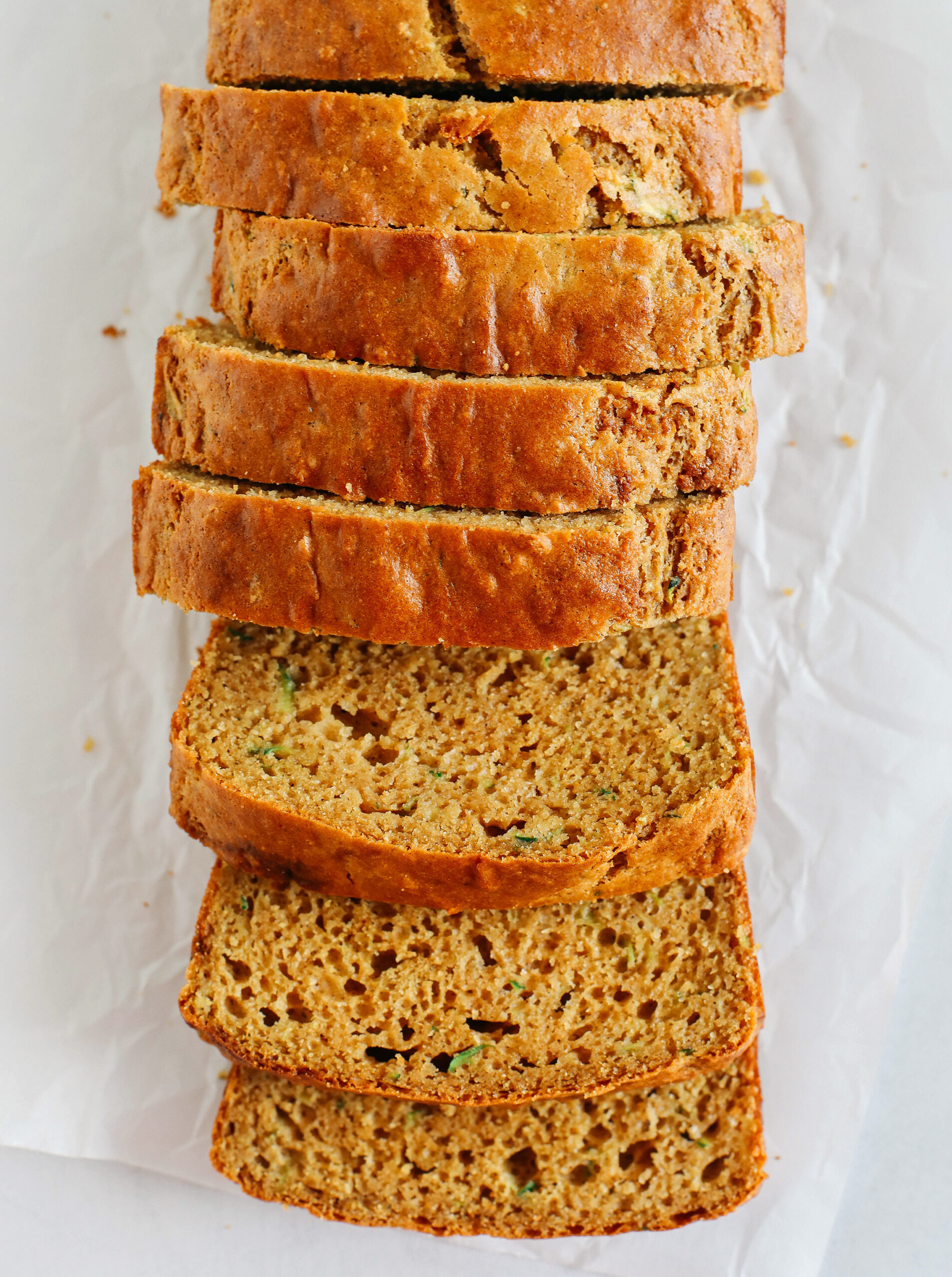 This Healthy Zucchini Bread is moist, fluffy, and made healthier with whole wheat flour, Greek yogurt, shredded zucchini and zero butter or refined sugar.  Perfect for breakfast or an easy snack!