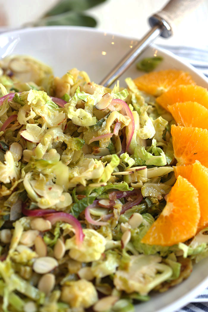 This Warm Brussels Sprouts and Sage Salad is a delicious sweet yet savory dish that is easily thrown together for a quick healthy meal option! eat-yourself-skinny.com