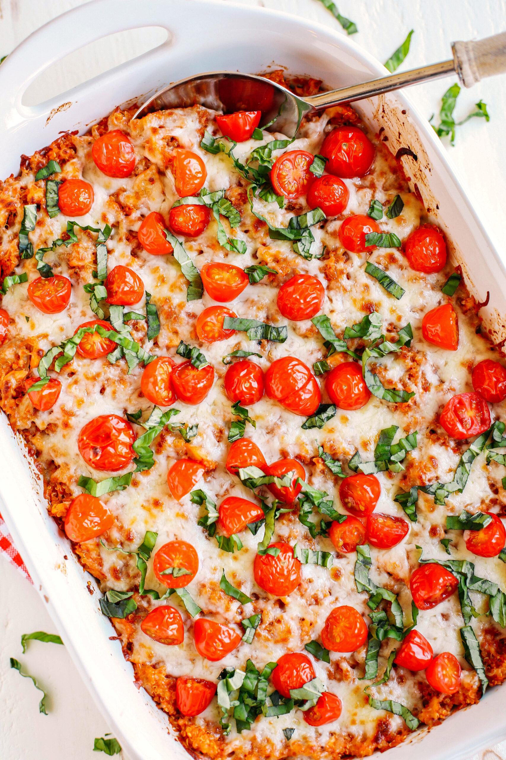 This super flavorful Cheesy Caprese Chicken and Quinoa Casserole is the perfect weeknight meal that is hearty, full of flavor and sure to please the entire family!