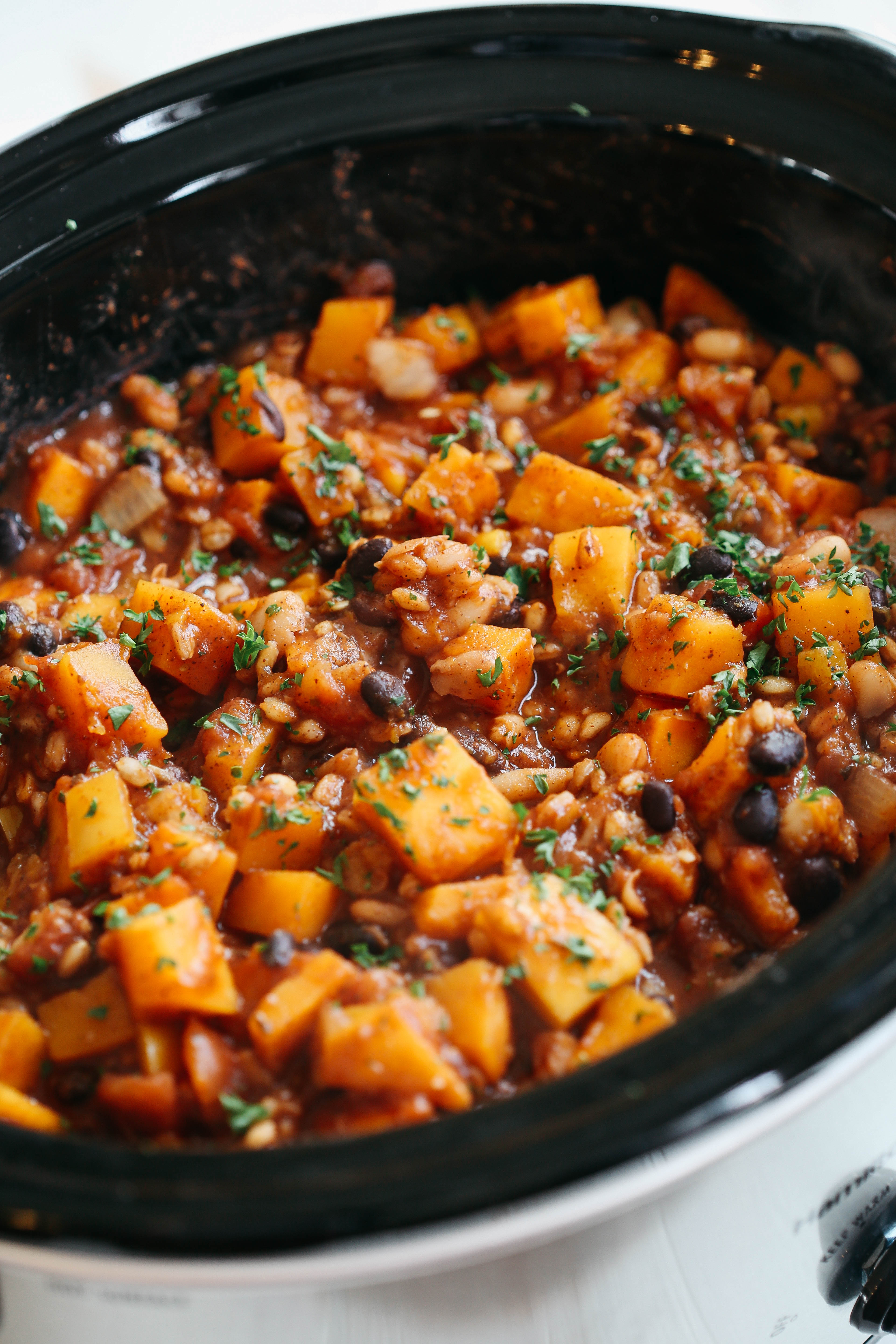 This Slow Cooker Butternut Squash and Farro Chili is healthy, hearty and the perfect delicious recipe to warm you up in the colder months!