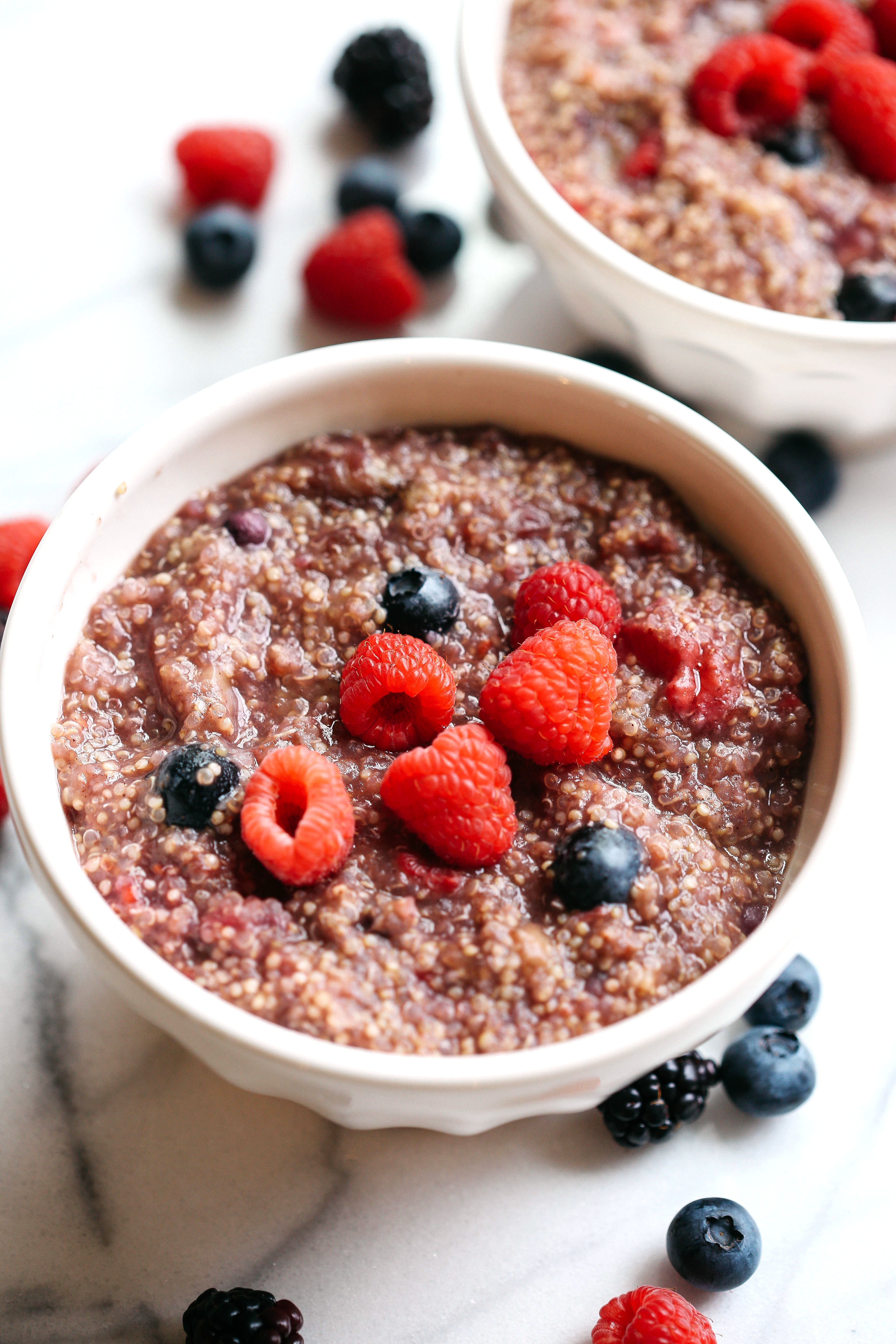 This protein-packed Slow Cooker Berry Breakfast Quinoa is the perfect way to start your mornings and can easily be made by throwing just a few simple ingredients into your crock pot!