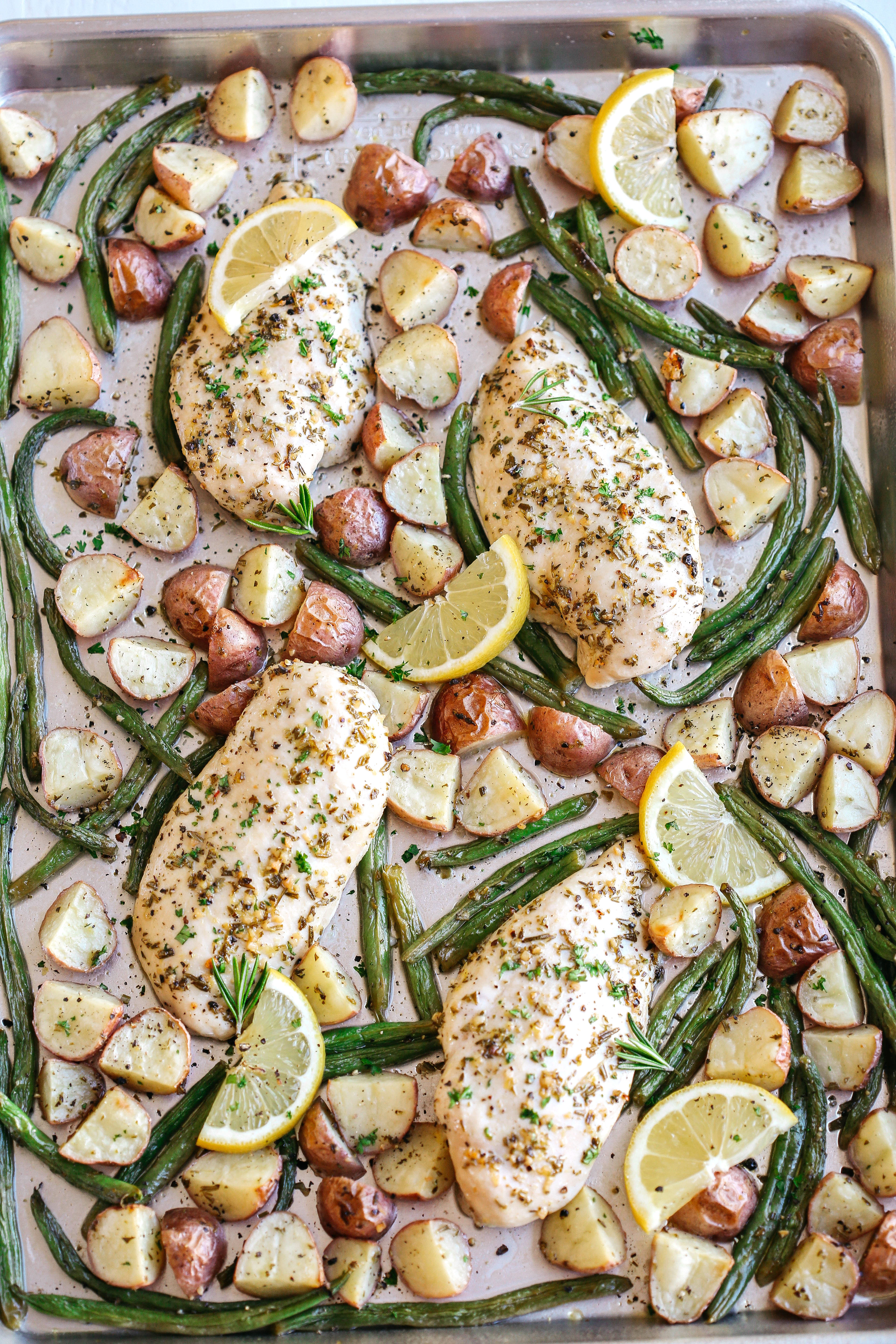 This Sheet Pan Lemon Rosemary Chicken and Potatoes make the perfect weeknight dinner that's quick, healthy and easily made all on one pan!