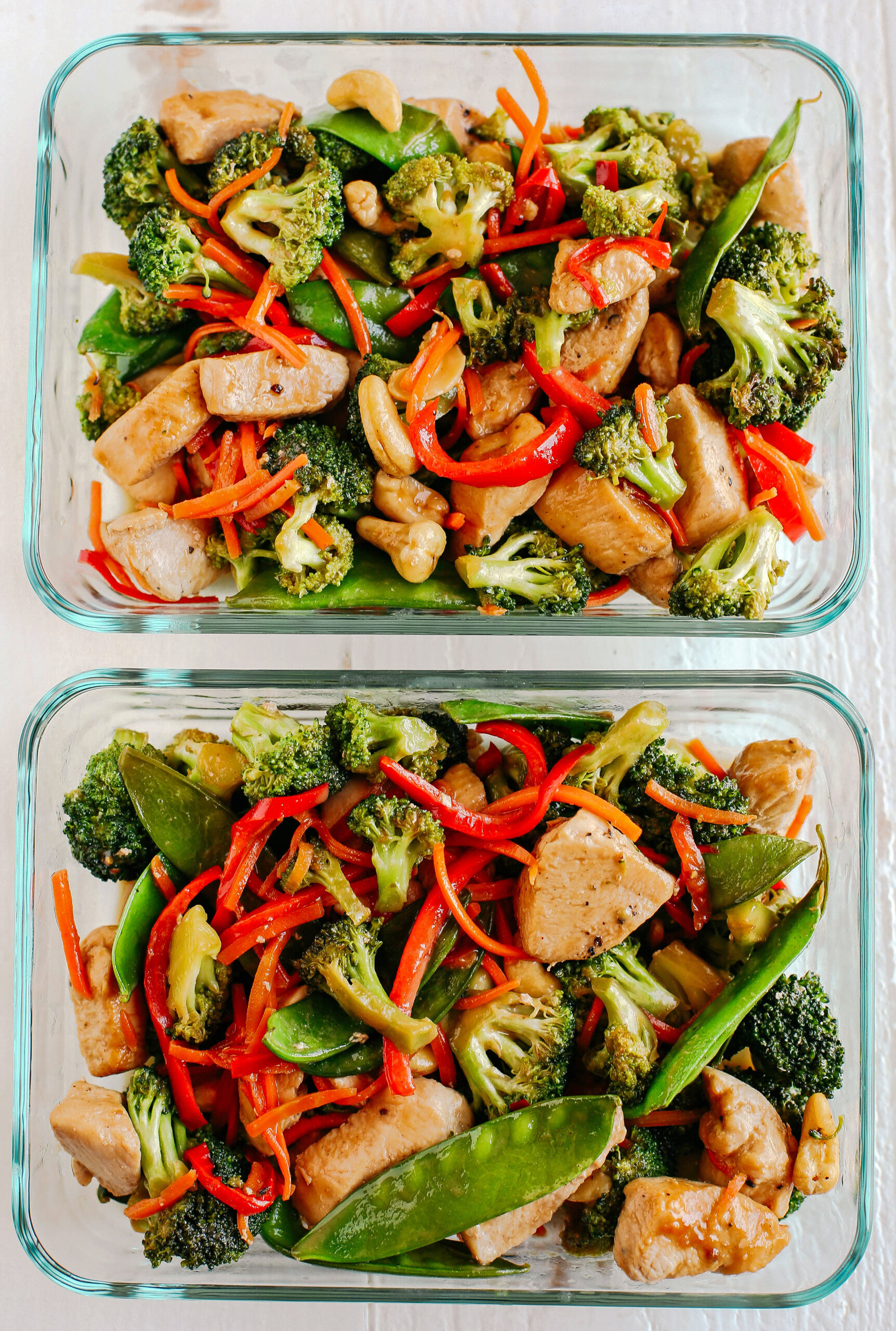 This One Skillet Cashew Chicken Stir Fry is the perfect weeknight meal that is quick and easy to make, full of fresh veggies and tossed together in a delicious homemade peanut sauce!
