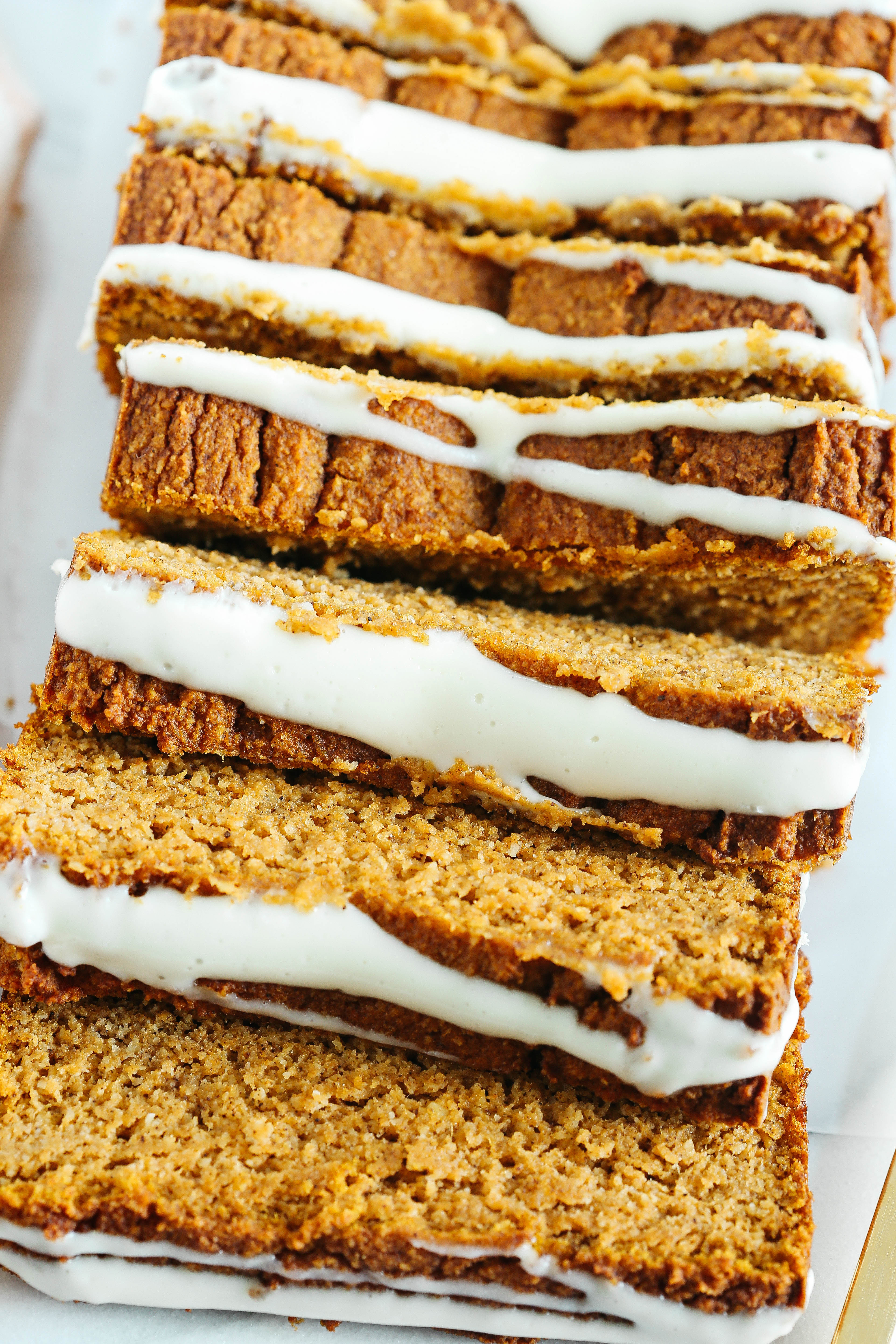 The BEST Almond Flour Pumpkin Bread recipe that is a must to make this fall!  Super moist, easy to make and drizzled with a delicious cream cheese glaze!