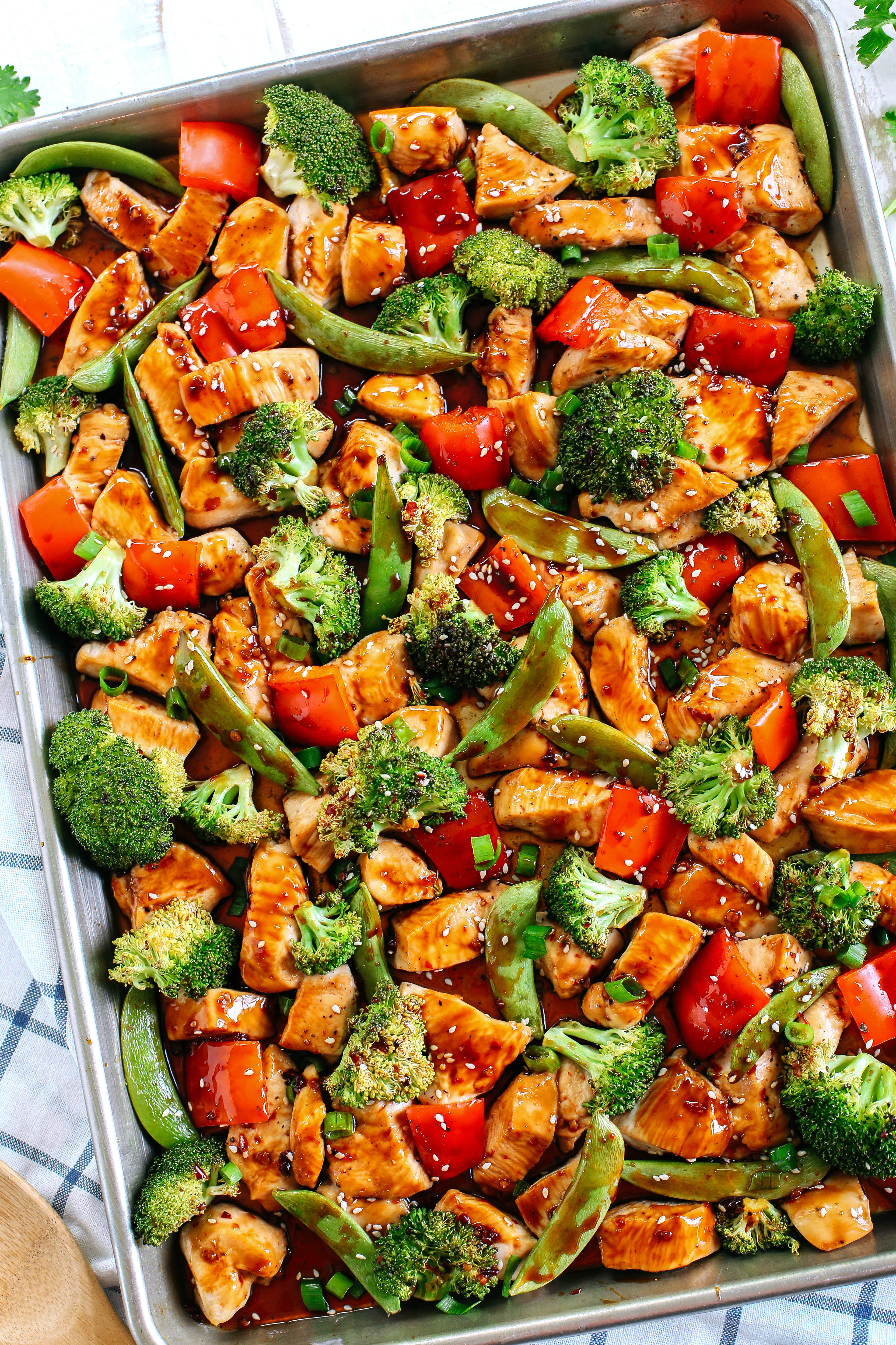 This Sheet Pan Sesame Chicken and Veggies makes the perfect weeknight dinner that’s healthy, delicious and easily made all on one pan in under 30 minutes!  Perfect recipe for your Sunday meal prep too!  