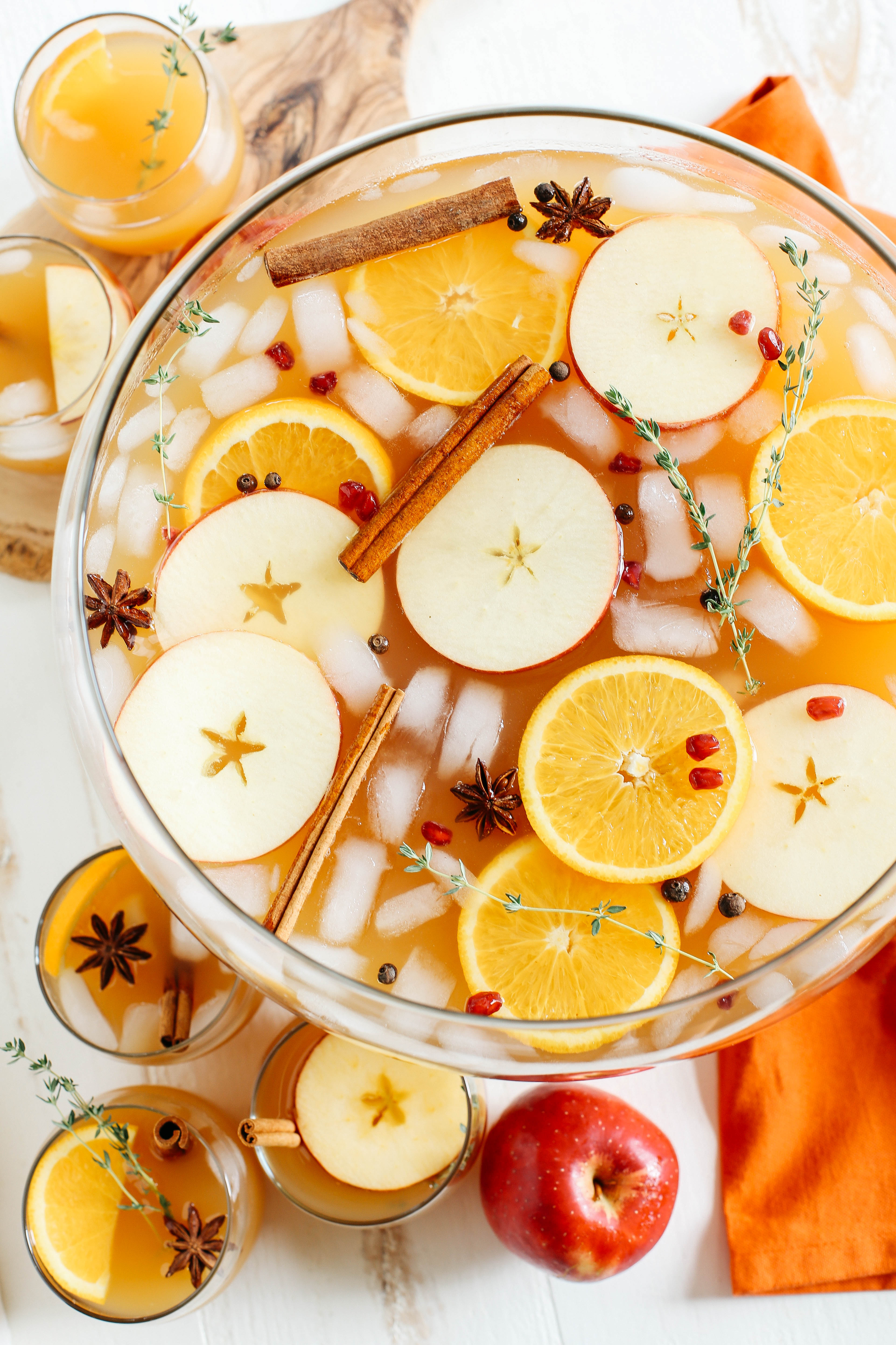 This Harvest Apple Cider Punch makes the perfect addition to any holiday party or gathering with a delicious combination of your favorite fall flavors all marinated together in one festive cocktail!