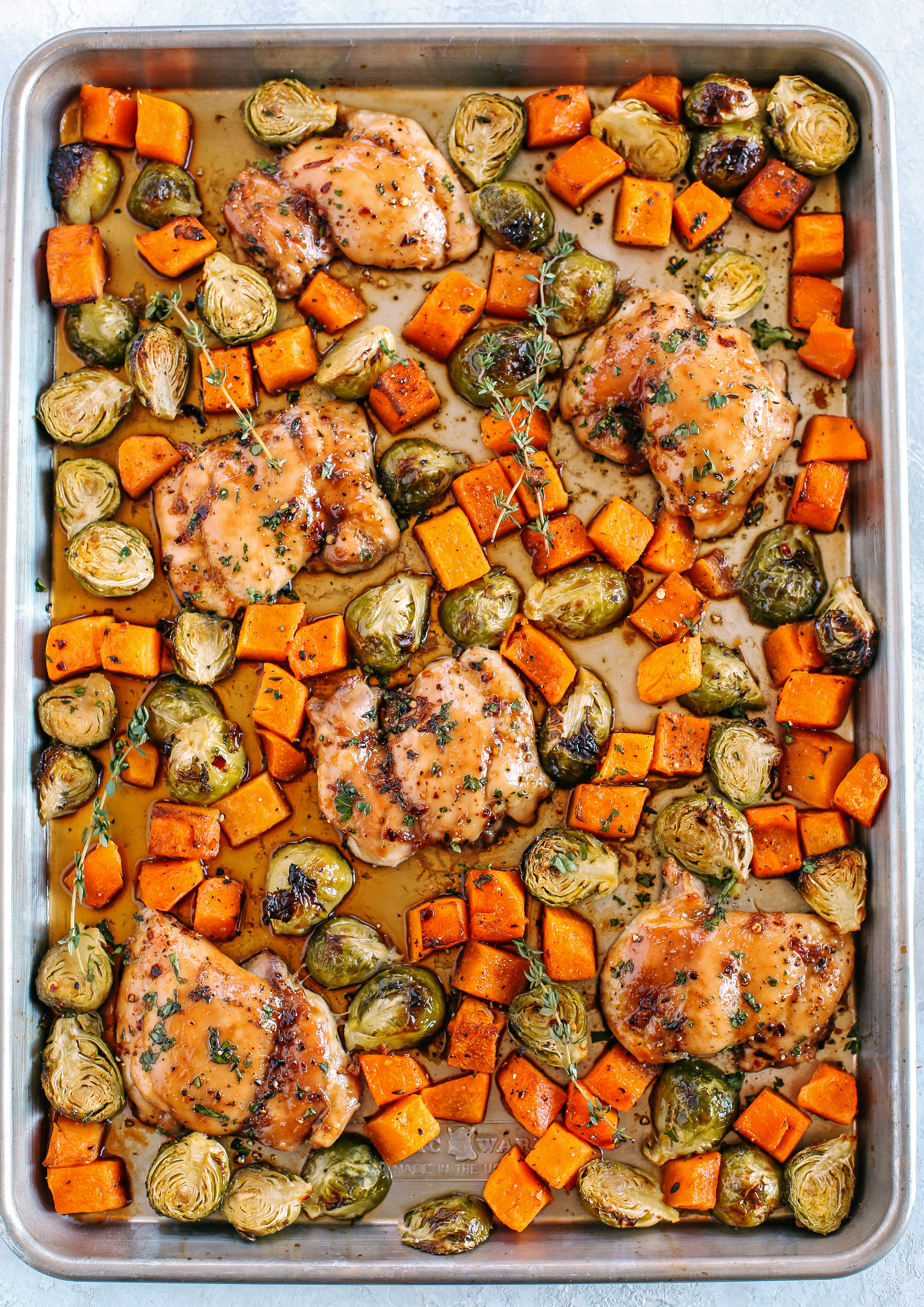 This Sheet Pan Ginger Maple Chicken with Brussels Sprouts and Butternut Squash makes the perfect weeknight dinner that’s healthy, delicious and easily made all on one pan in under 30 minutes!  