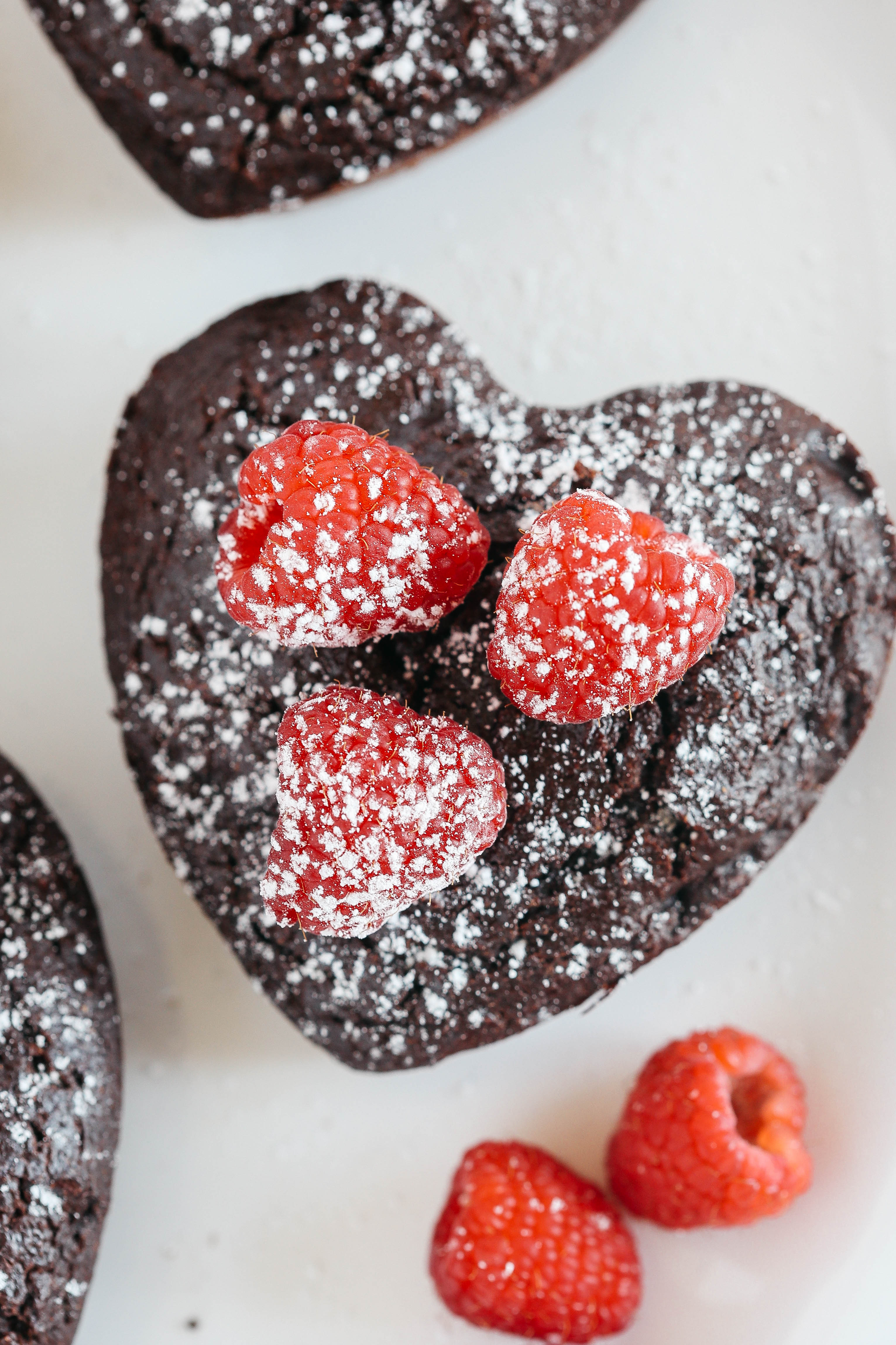 Perfectly portioned Mini Chocolate Cakes with delicious raspberry filling in every bite!  Gluten-free, dairy-free, refined sugar-free and SUPER moist!