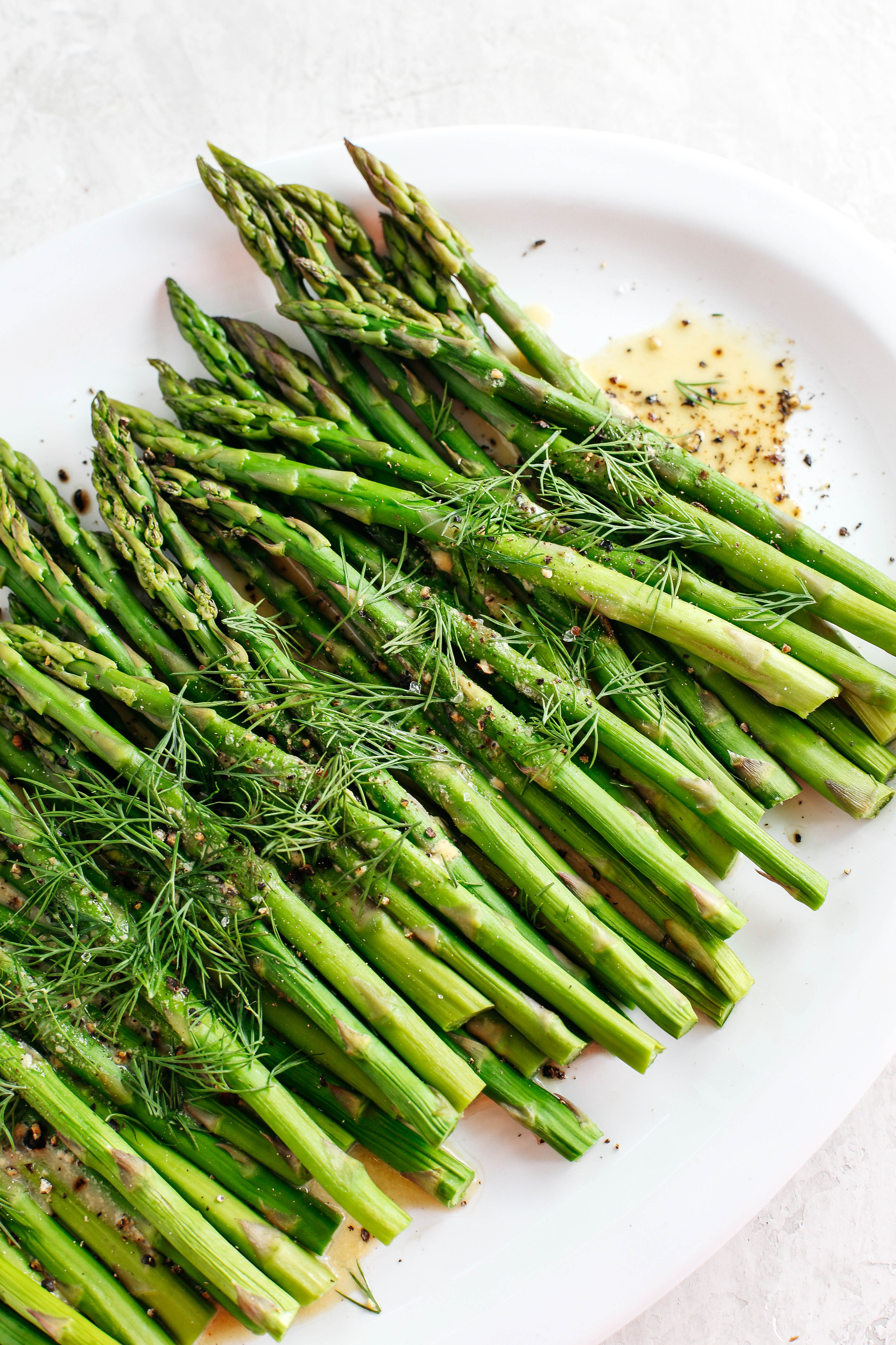 Baked Asparagus with delicious Mustard Dill Sauce makes the perfect healthy side dish for any meal with just a few simple ingredients! 
