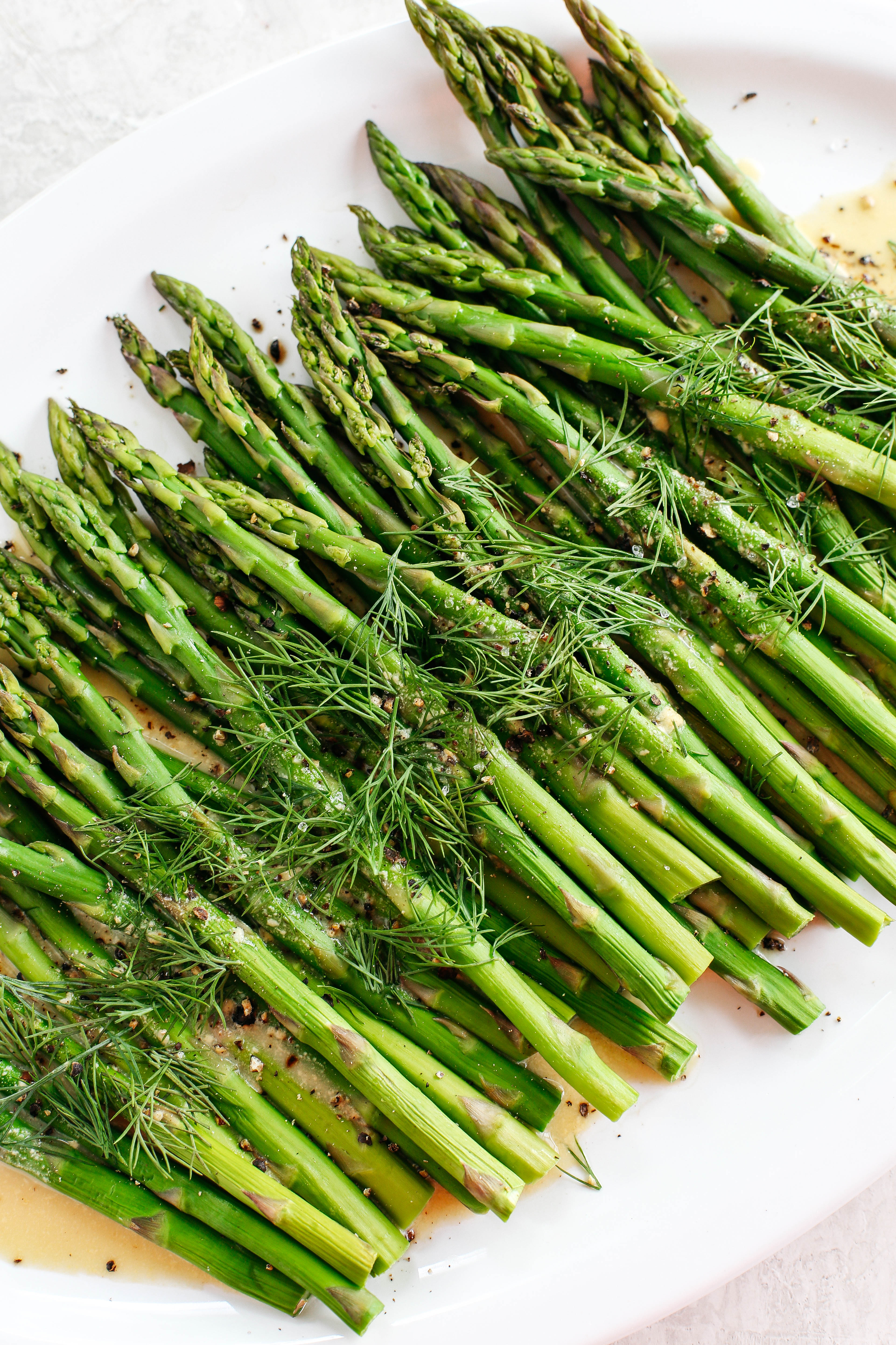 Baked Asparagus with delicious Mustard Dill Sauce makes the perfect healthy side dish for any meal with just a few simple ingredients! 