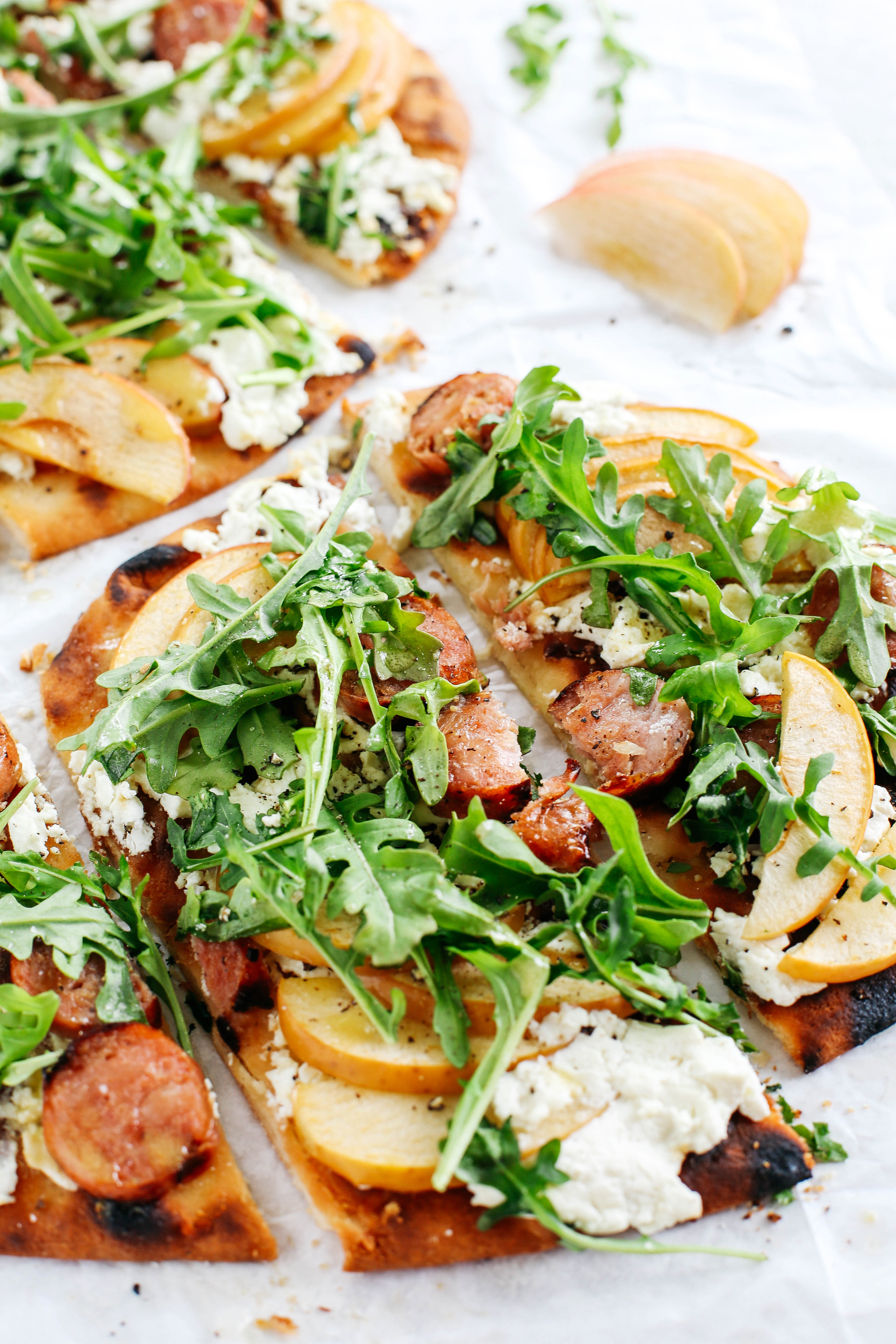 Kick off the summer with this Grilled Sausage & Apple Pizza with Goat Cheese that combines your favorite sweet and savory flavors into one delicious meal!