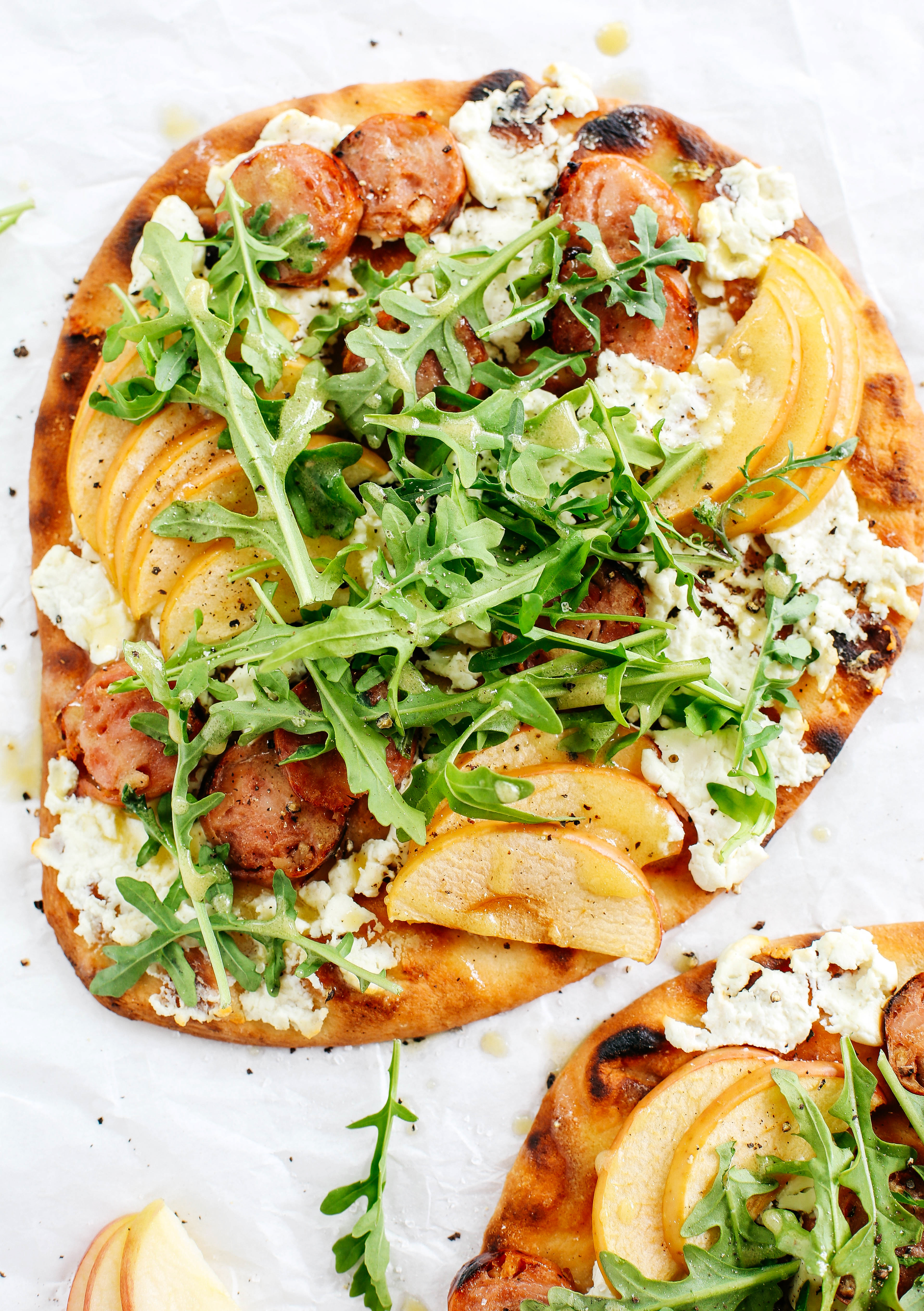 Kick off the summer with this Grilled Sausage & Apple Pizza with Goat Cheese that combines your favorite sweet and savory flavors into one delicious meal!