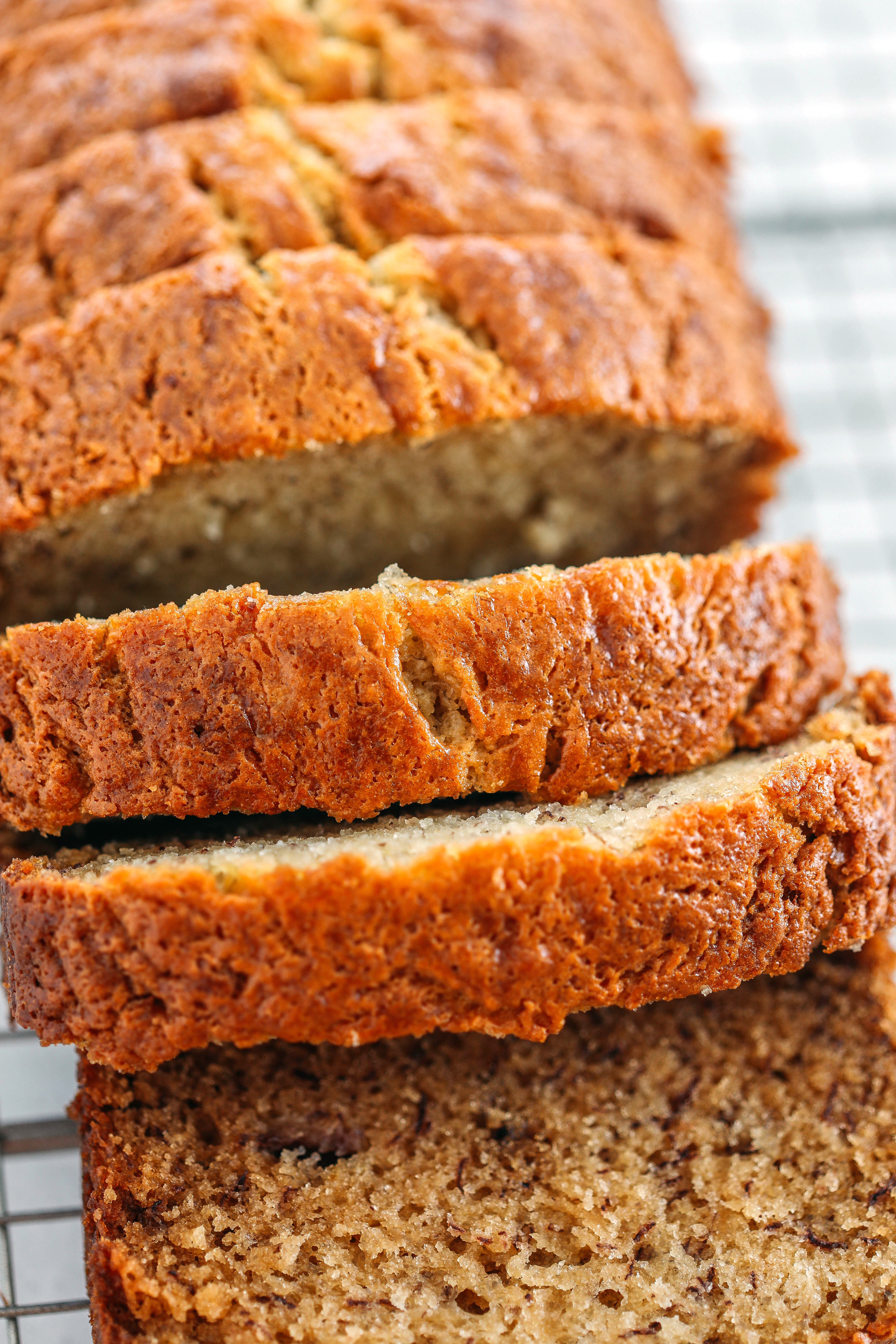 My Grandma's tried and true Easy Banana Bread recipe is a classic favorite and hands down the BEST!  Perfectly sweet, super moist and loaded with delicious banana flavor!