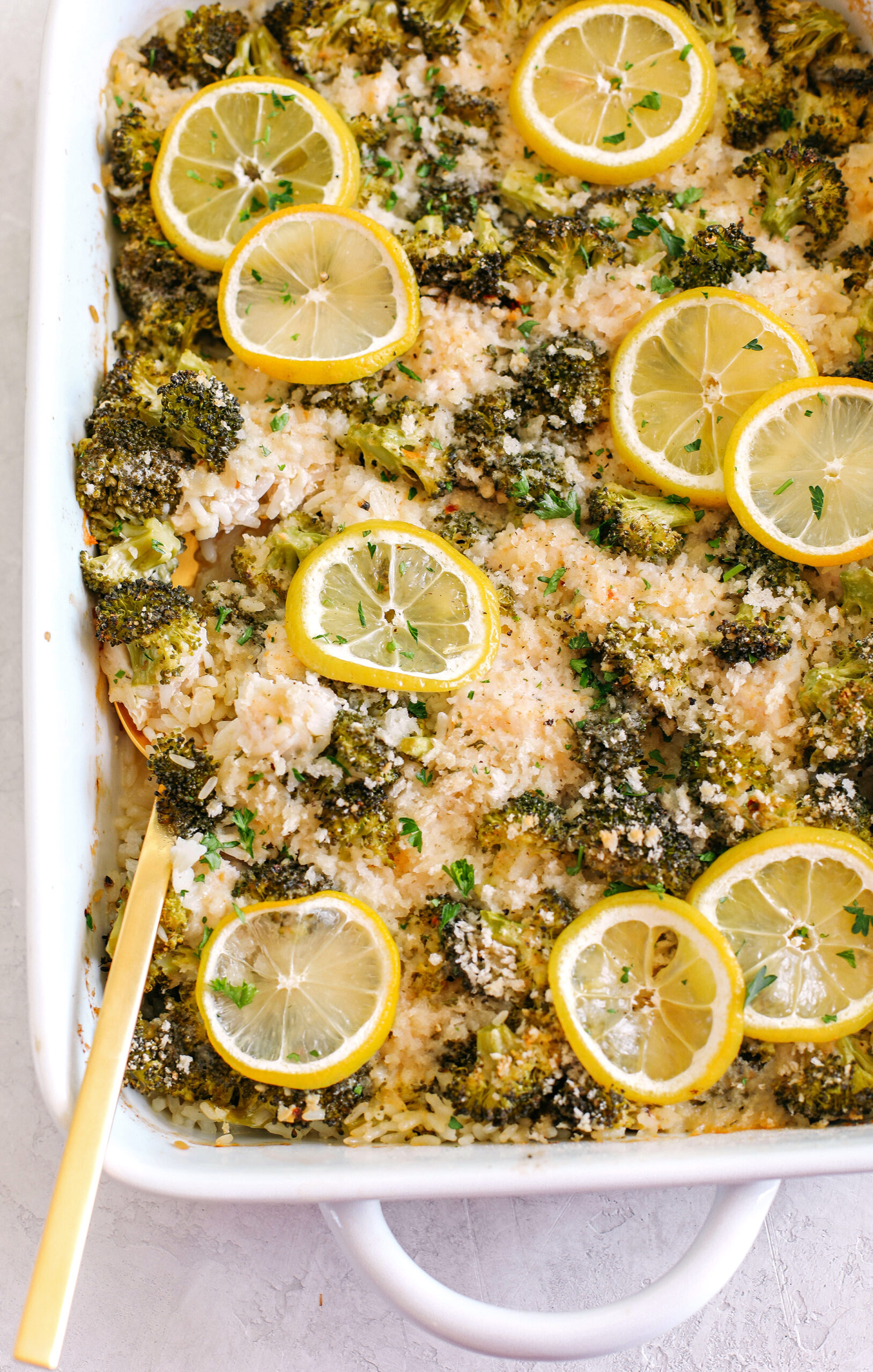 This Creamy Lemon Chicken, Broccoli and Rice Casserole is the perfect weeknight meal that is full of so much flavor and easily made in one dish without pre-cooking anything beforehand!