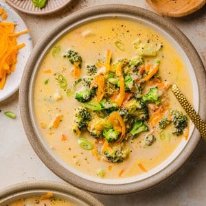 Creamy broccoli cheddar soup packed with tender broccoli and carrots and made extra creamy with blended cauliflower, sharp cheddar and a touch of cream cheese.