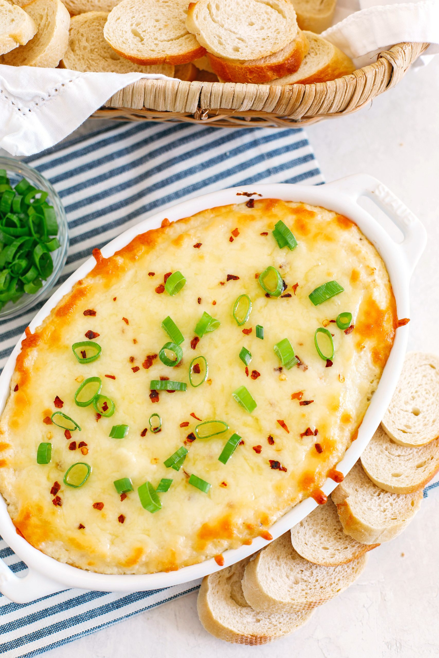 This creamy and delicious Cheesy Roasted Cauliflower Dip makes the perfect healthy appetizer that is easy to make and full of so much flavor!