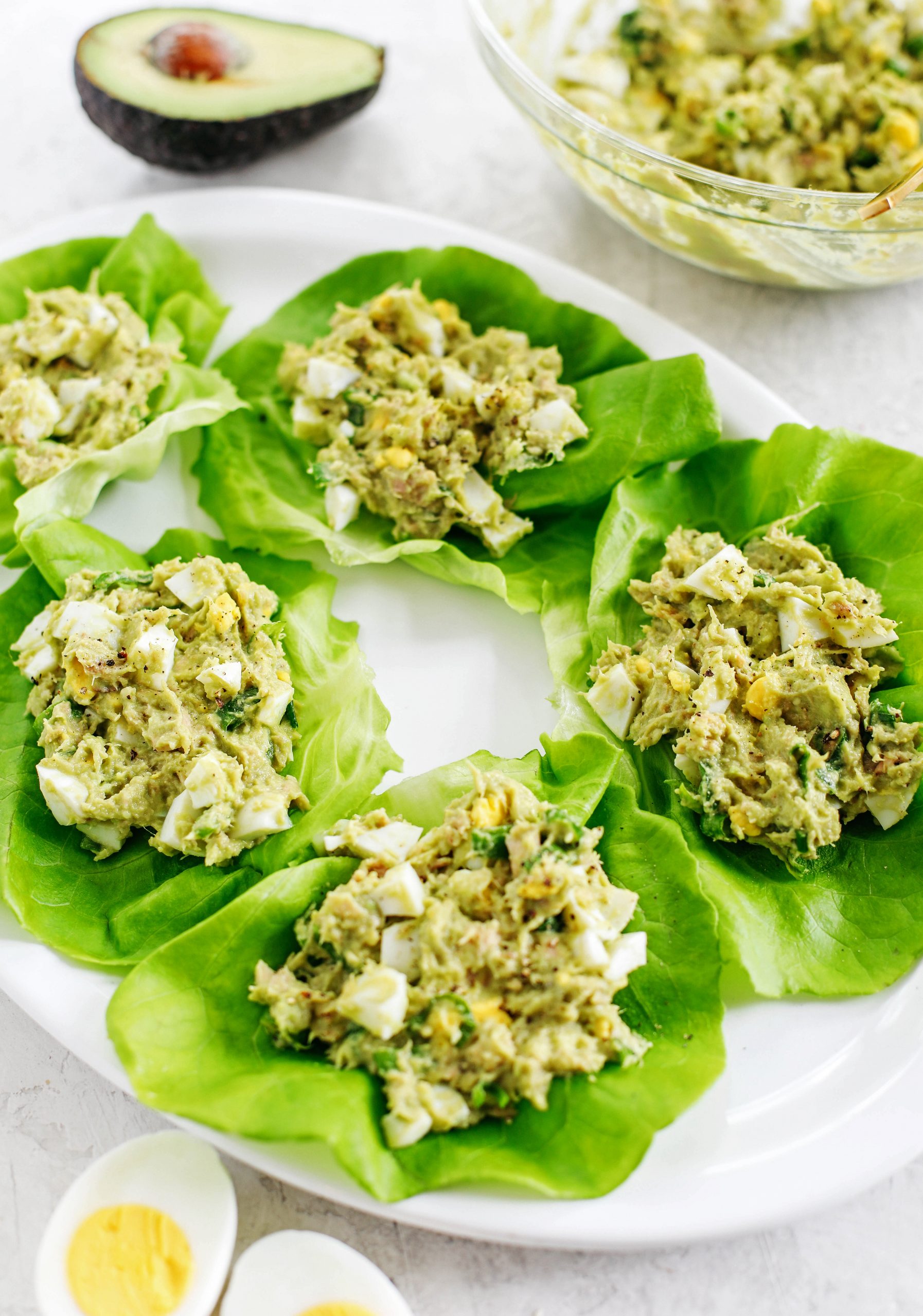This 5-ingredient Tuna Avocado Egg Salad is fresh, delicious and only takes about 5 minutes to throw together for a healthy, protein-packed meal!  No mayo necessary!