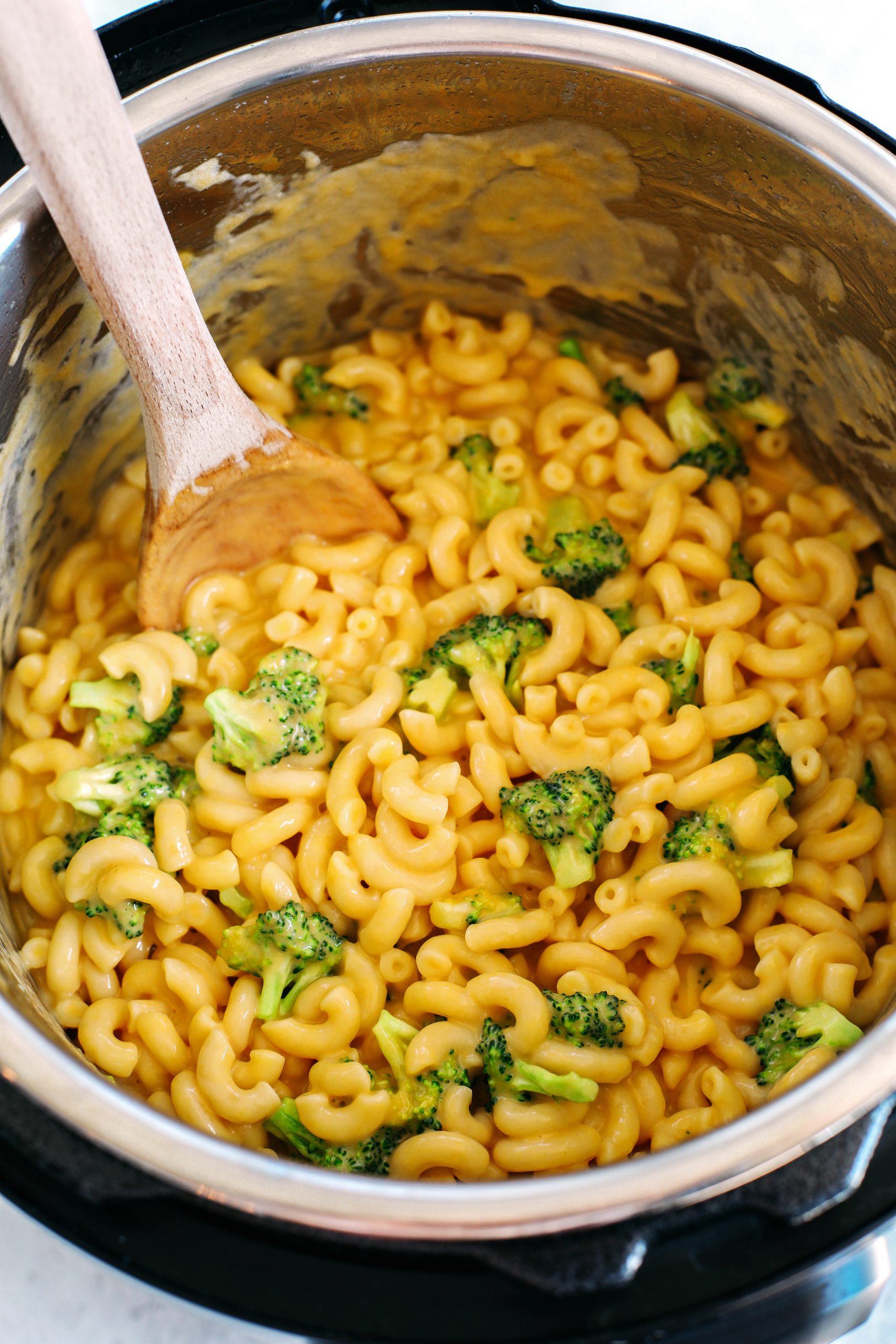 Creamy and delicious Instant Pot Mac & Cheese with Broccoli easily made in under 10 minutes for the perfect comfort food meal your whole family will love!