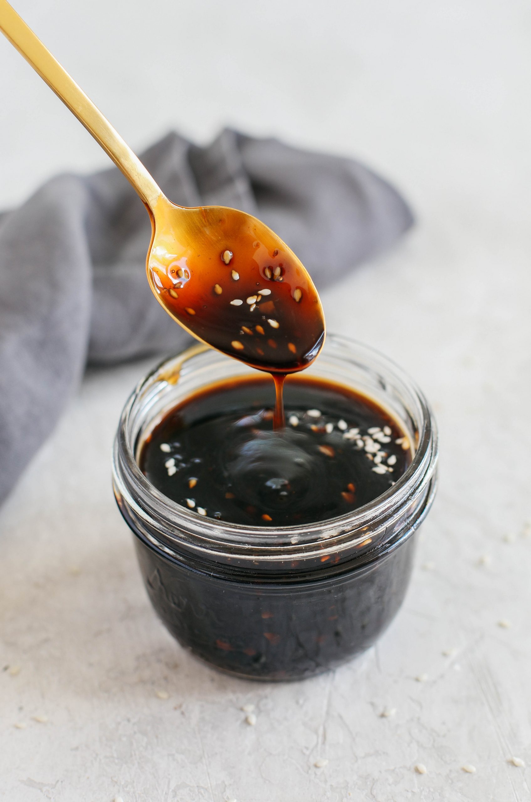 Skip store-bought and make this EASY Healthy Teriyaki Sauce that is sticky, sweet and made in just 5 minutes using fresh, simple ingredients!