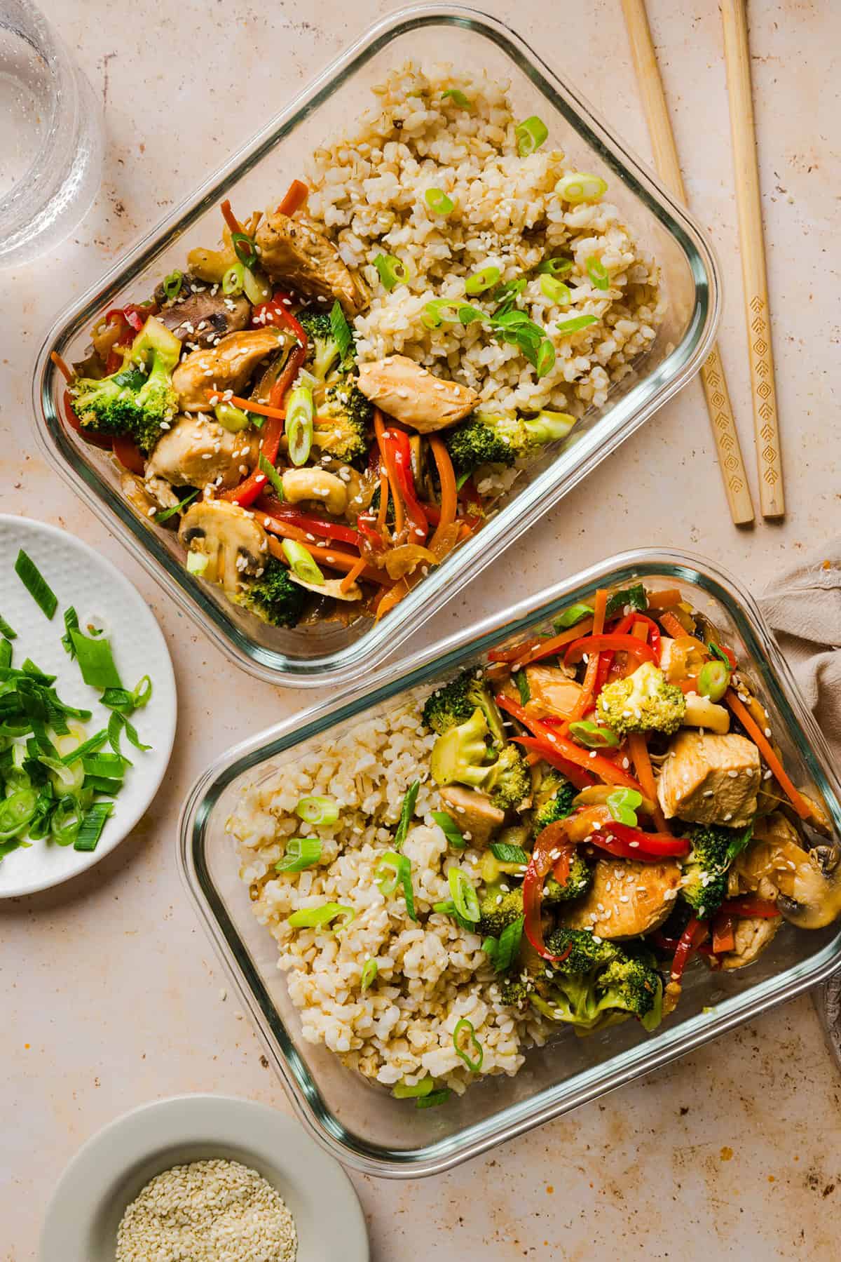 Teriyaki chicken with vegetables served over fluffy white rice ready for meal prep.