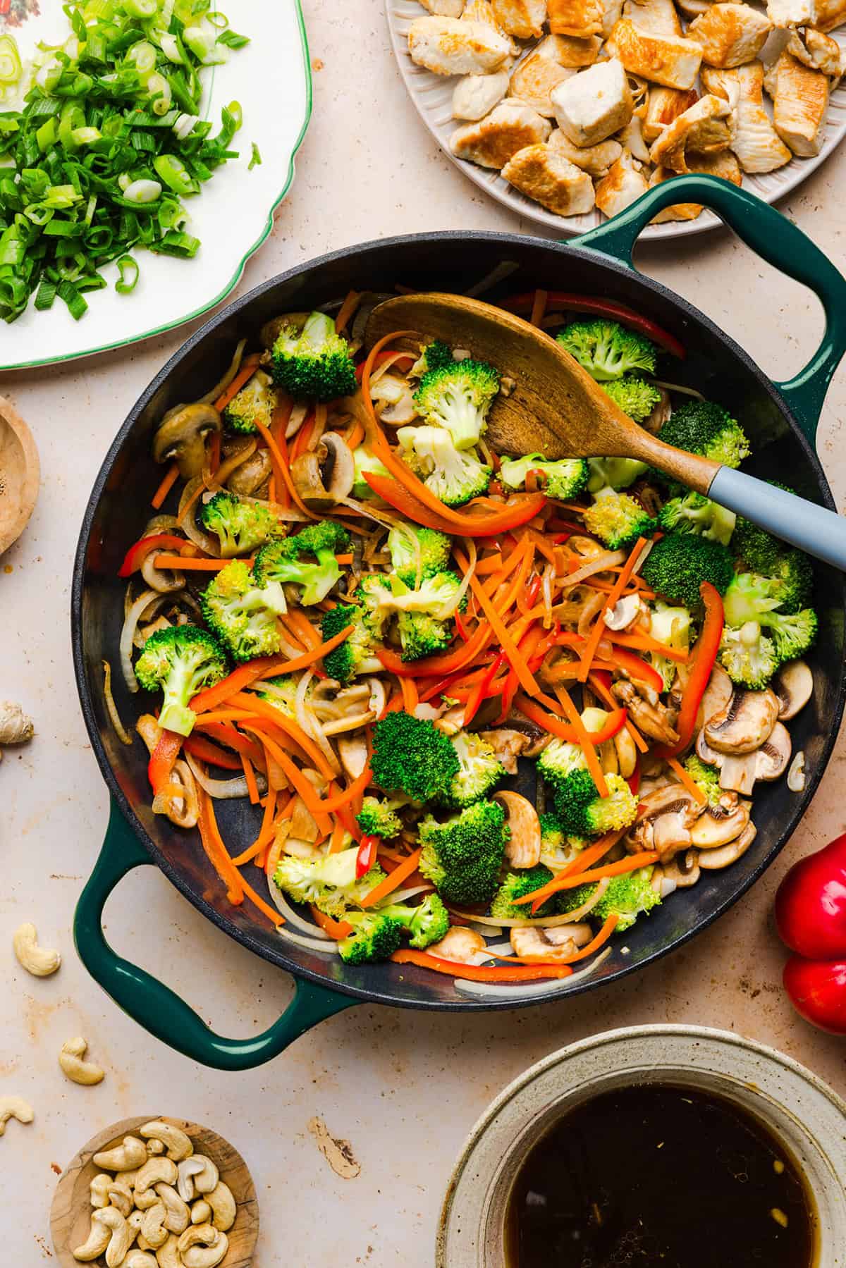 Teriyaki chicken stir fry with tender chicken, broccoli, bell peppers and carrots in a homemade teriyaki sauce