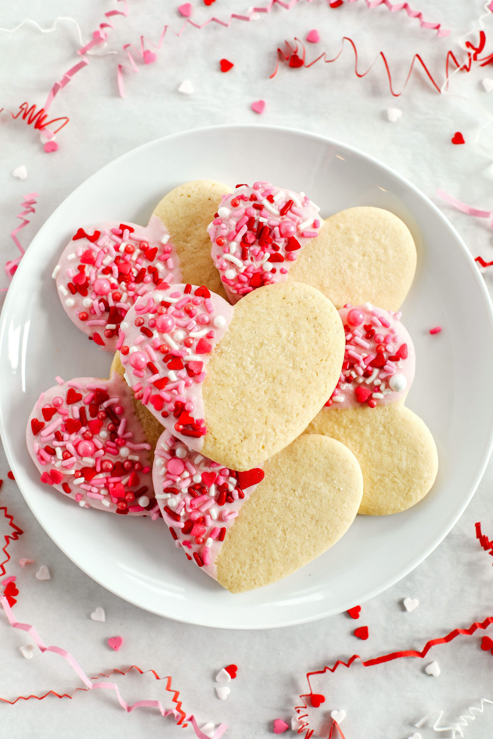 These Valentine's Day Grain-Free Sugar Cookies are soft on the inside and deliciously chewy on the outside!  Cut them into fun shapes and have fun decorating them for Valentine's Day!