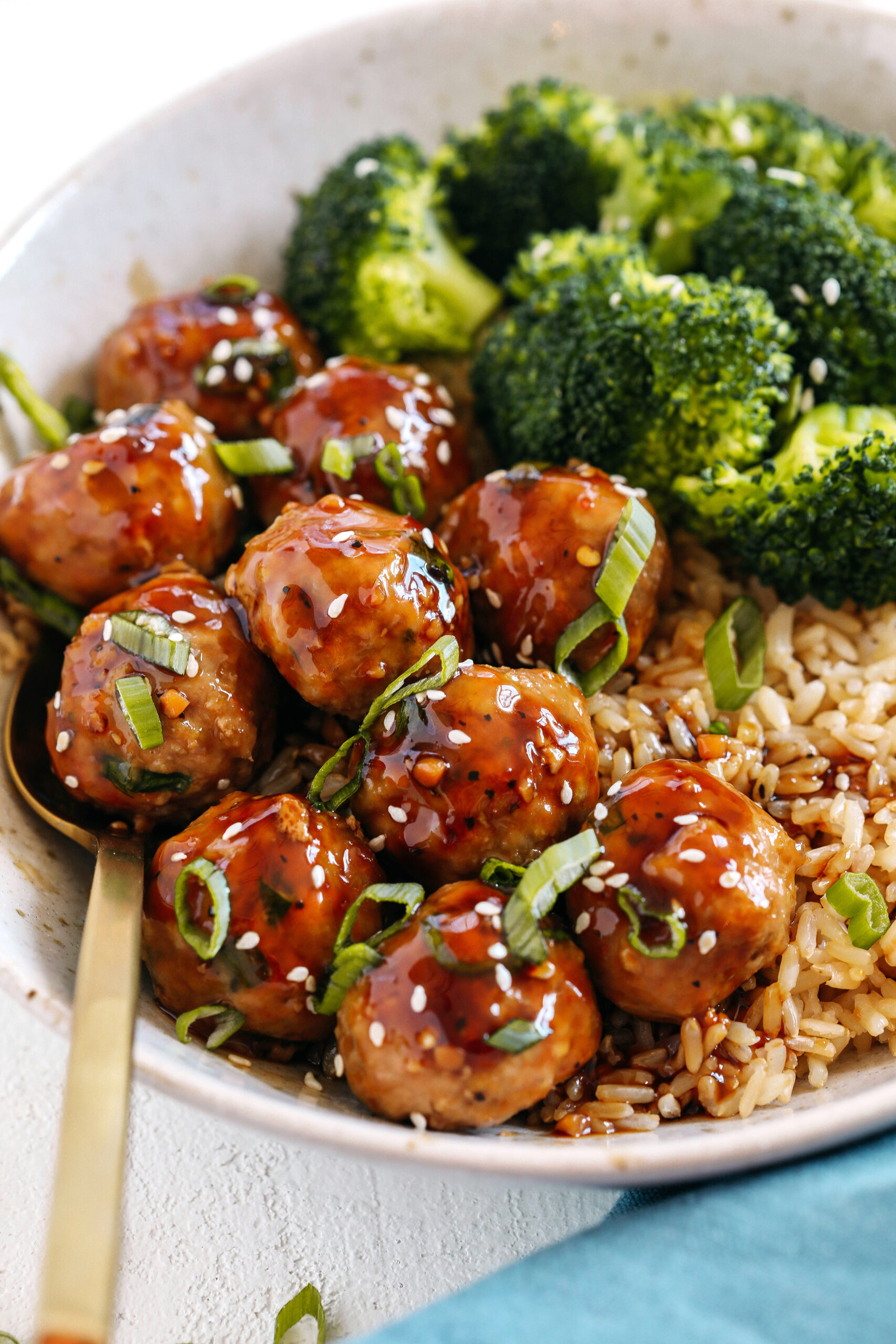These tender Asian Glazed Turkey Meatballs are always a hit with our family!  Coated in the most delicious sticky sweet sauce and easily made in less than 30 minutes!