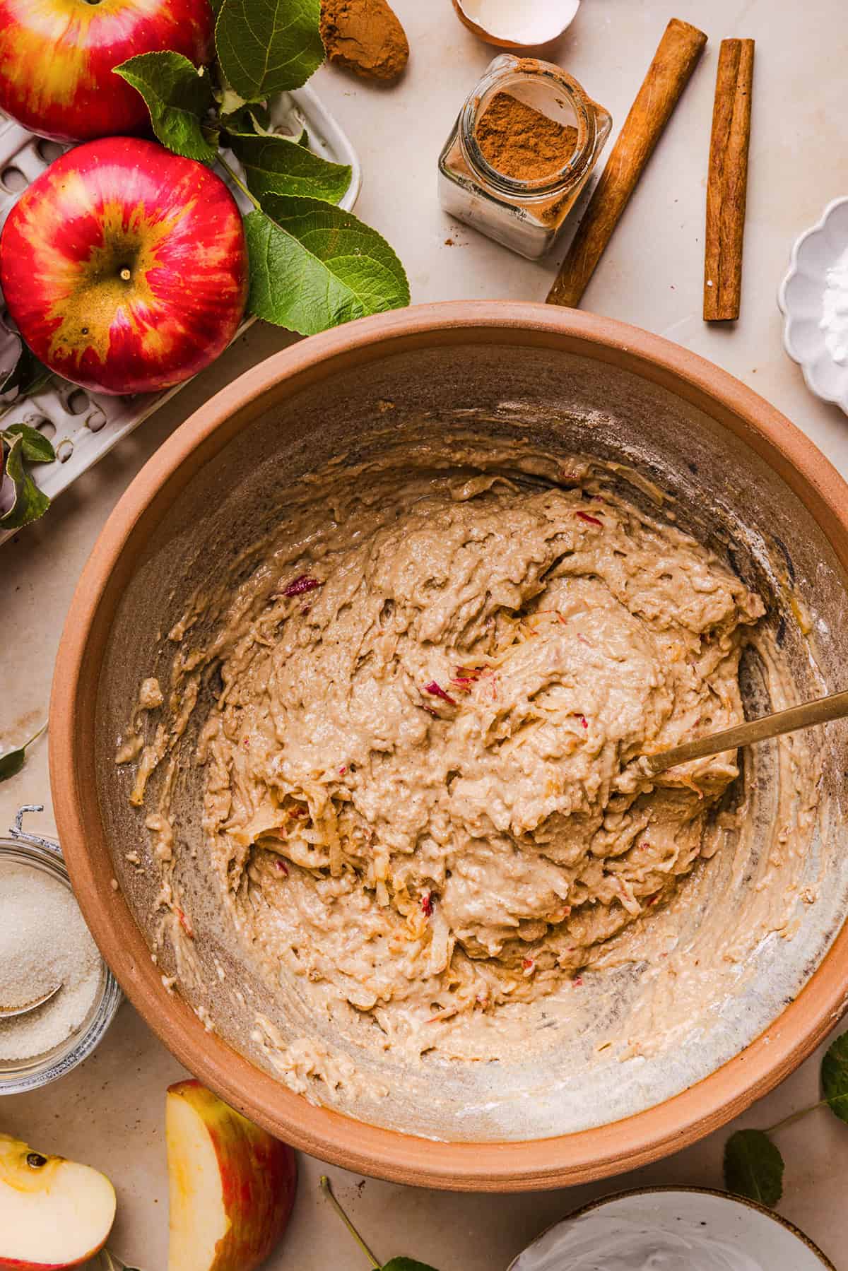 Apple cinnamon muffin batter made with shredded fresh apple