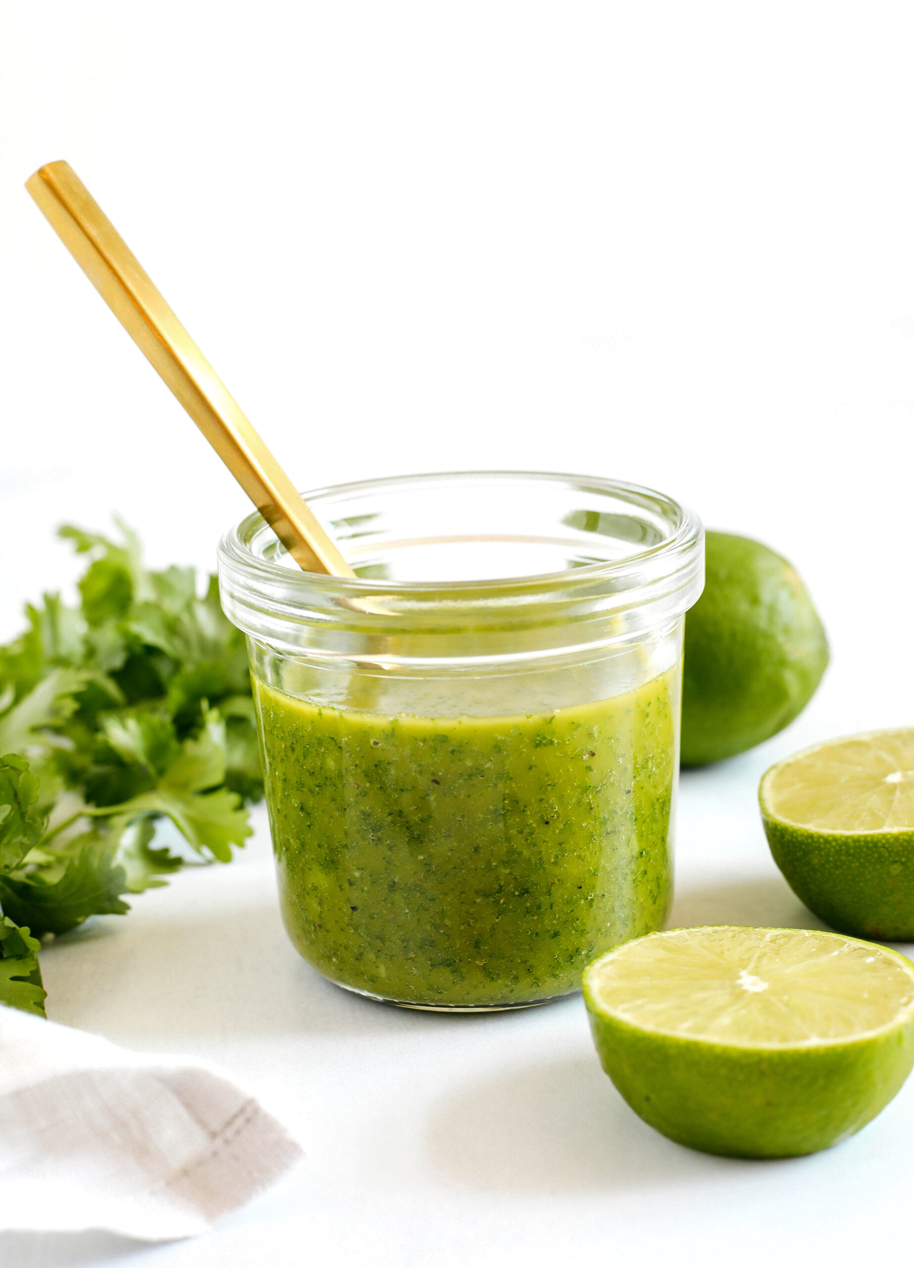 Bright and tangy Cilantro Lime Dressing made with fresh ingredients and easily thrown together in just 5 minutes with so much flavor!  Perfect for salads, veggies, chicken, fish, tacos and more!