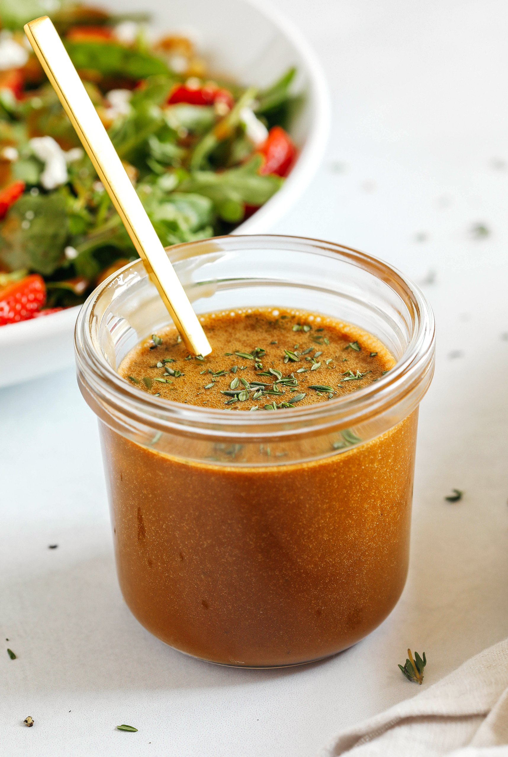 This Maple Balsamic Herb Dressing is fresh, tangy and made in just minutes with only 5 simple ingredients!  Perfect for salads, veggies, marinades, and more!