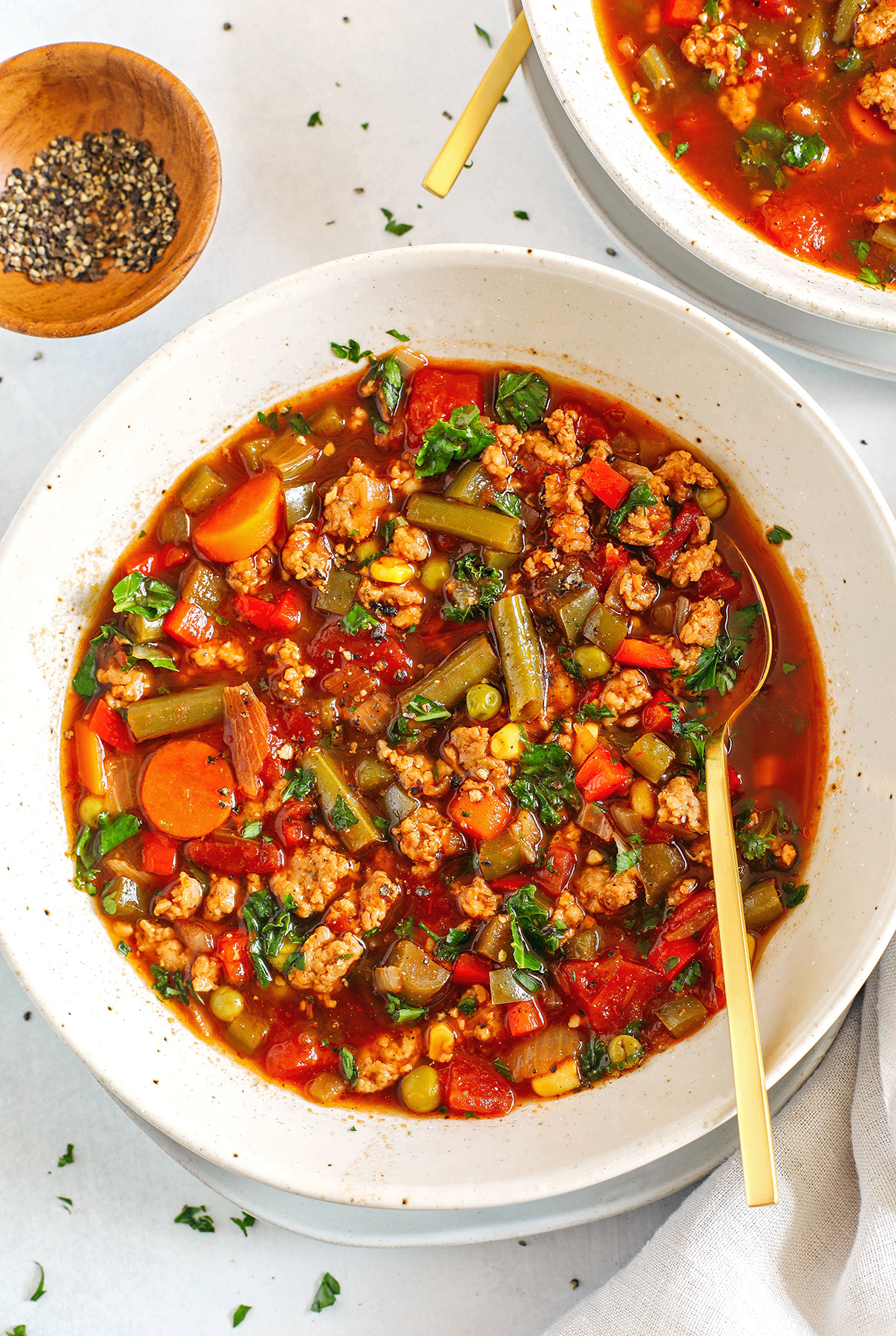 This One Pot Spicy Sausage and Kale Soup is hearty, loaded with a variety of vegetables and leafy kale, all simmered in flavorful beef broth, diced tomatoes and yes, a whole jar of salsa! 