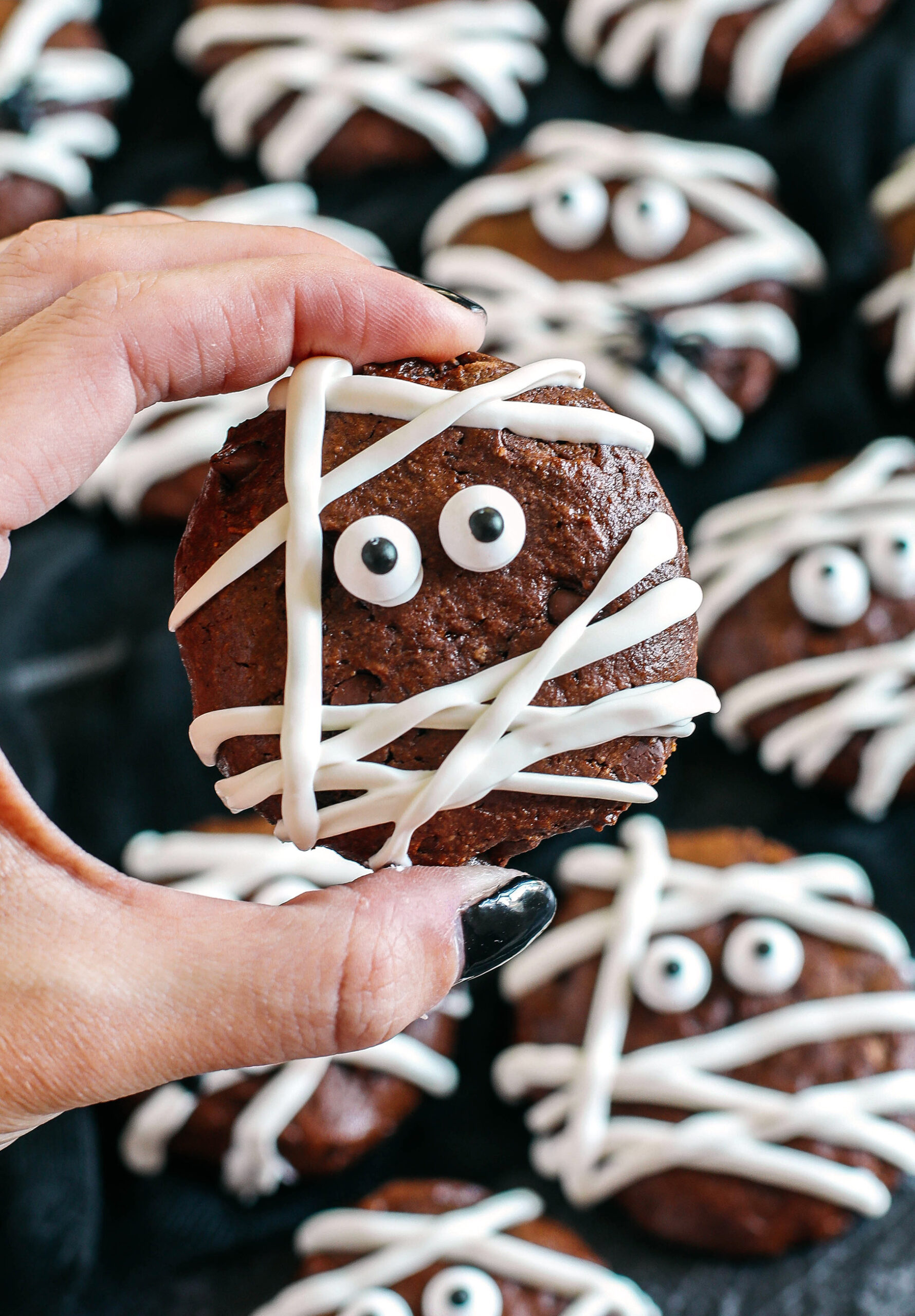 Get festive this Halloween with these delicious Chocolate Mummy Cookies!  Made healthier with zero butter, oil or refined sugar and are the perfect spooky treat your kids will love!