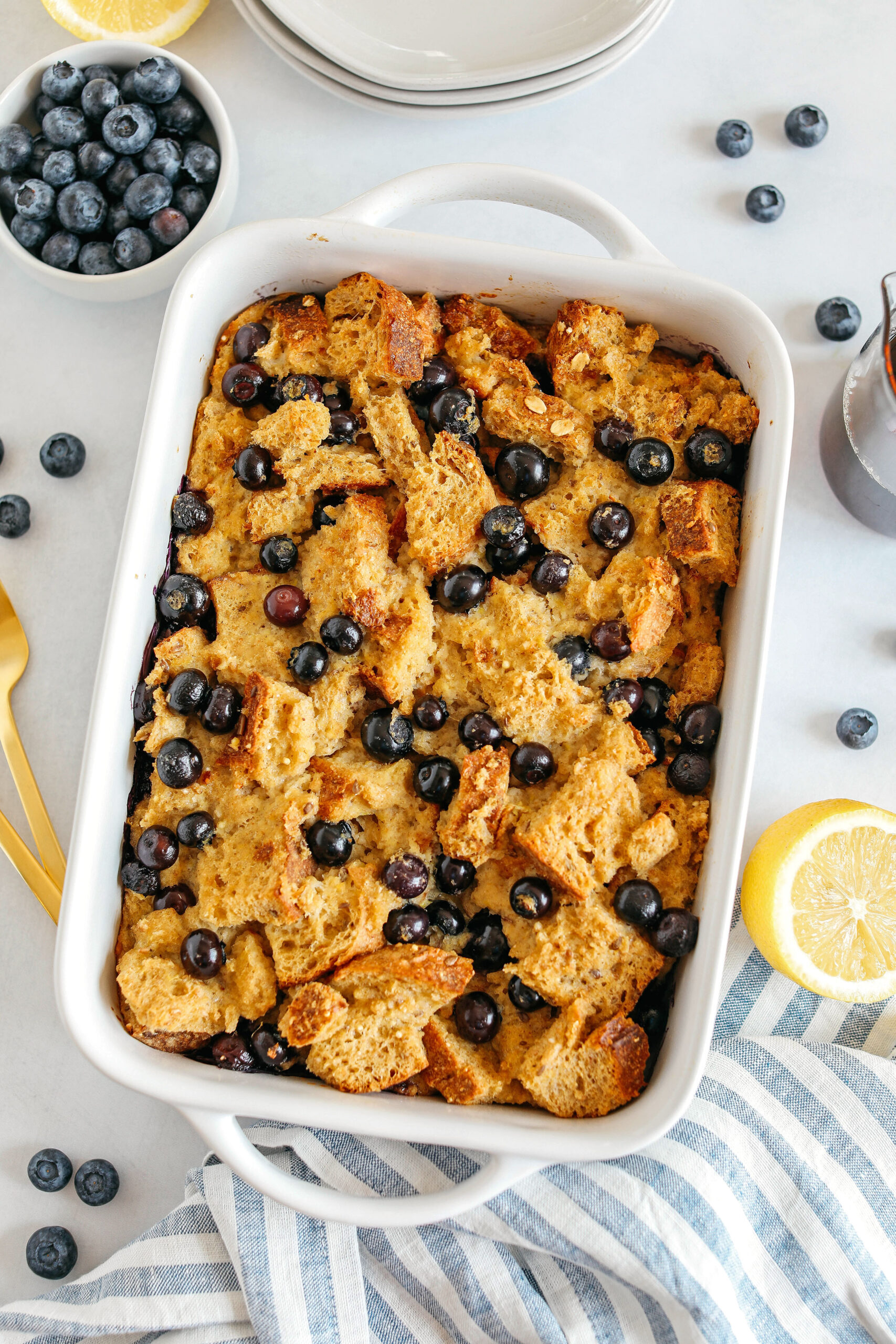 Warm and delicious Blueberry Lemon Bread Pudding lightened up with healthier ingredients and zero butter or refined sugar!  The perfect cozy dish for breakfast, brunch or dessert!