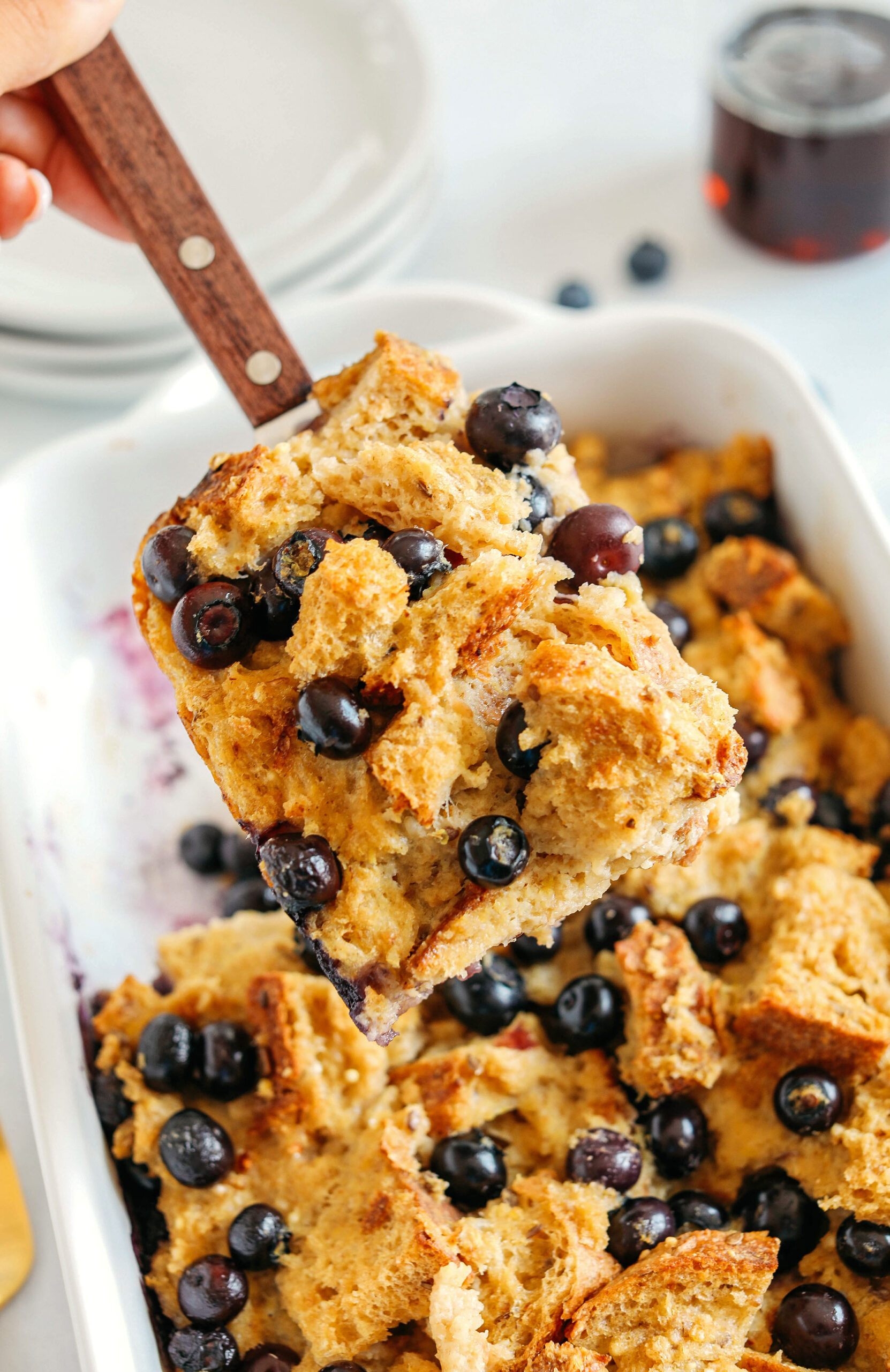 Warm and delicious Blueberry Lemon Bread Pudding lightened up with healthier ingredients and zero butter or refined sugar!  The perfect cozy dish for breakfast, brunch or dessert!