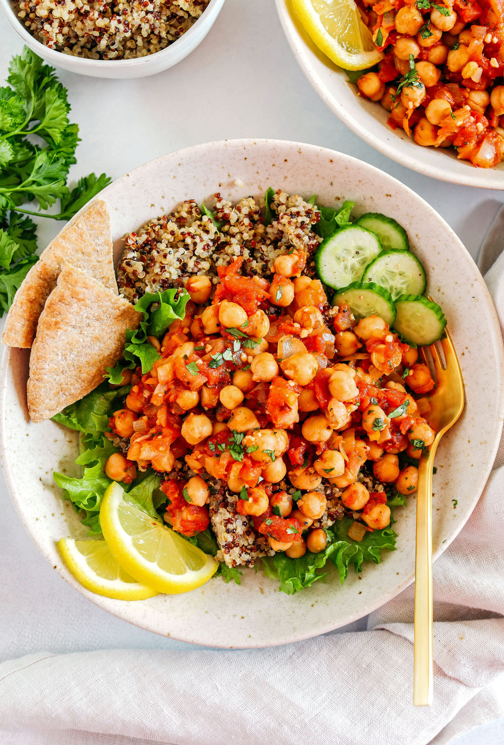 Protein-packed Spicy Chickpea Quinoa Bowls are loaded with flavor, perfect for meal prep and are easily made in just 20 minutes!  Drizzle my lemony tahini dressing over top for even more flavor!