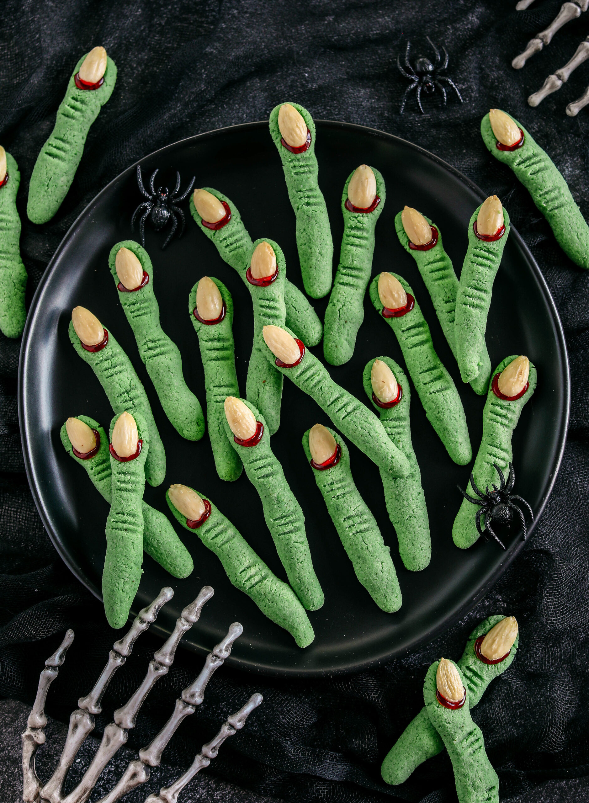 Festive gluten-free Spooky Witch Finger Cookies made healthier with almond flour and zero oil or refined sugar that make the perfect addition to your Halloween party!  Tasty almond flavored cookies that are simple and fun to make! 
