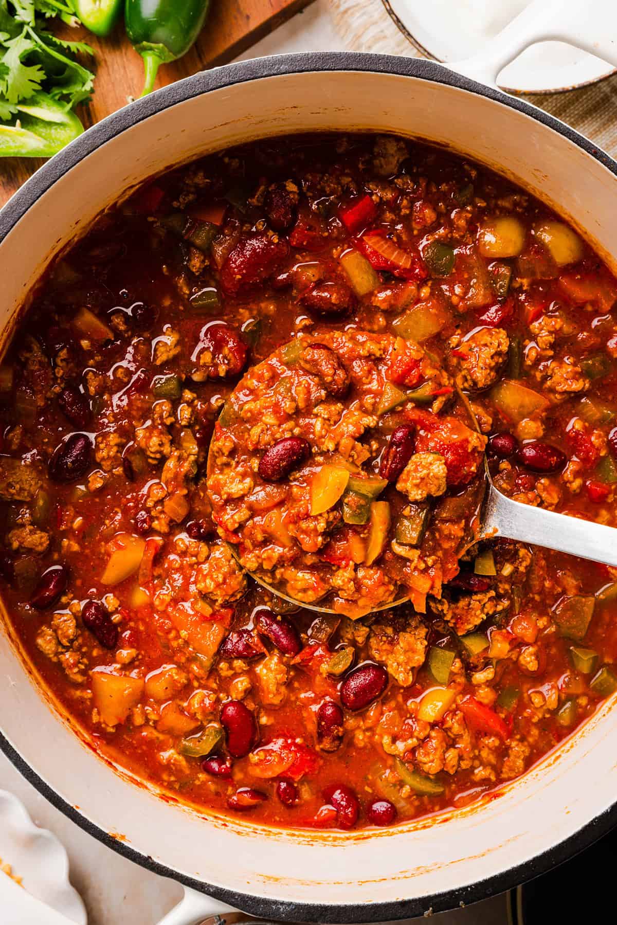 Close-up of hearty turkey chili with kidney beans and vegetables.