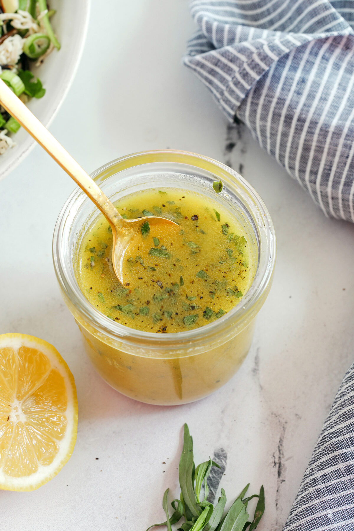 Bright and fresh Lemon Tarragon Salad Dressing made in minutes with just a few simple pantry ingredients!  Perfect for salads, veggies, marinades, and more!