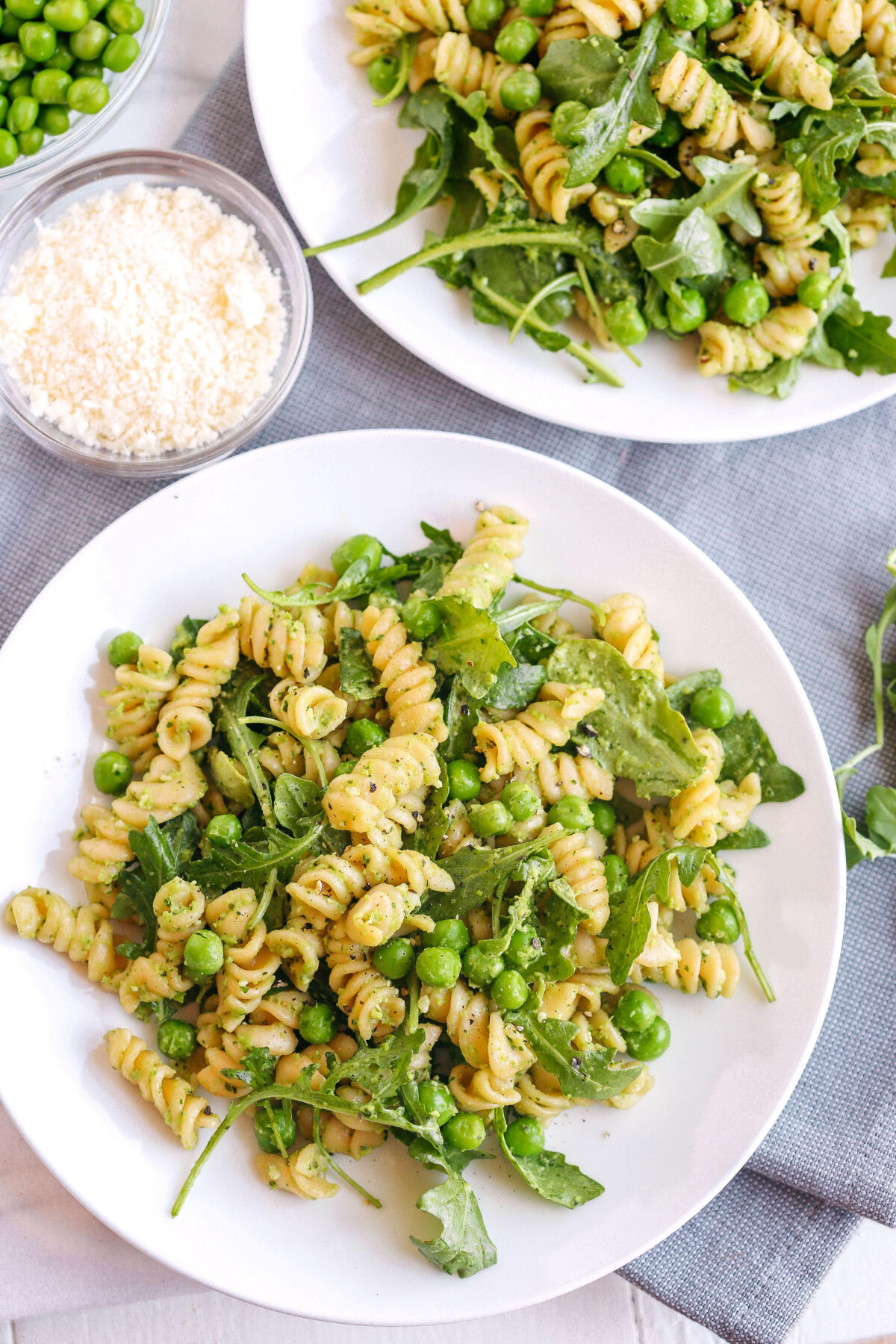 This light and fresh Pea and Arugula Pesto Pasta Salad is the perfect meal or side dish that is easy to make, healthy and delicious!